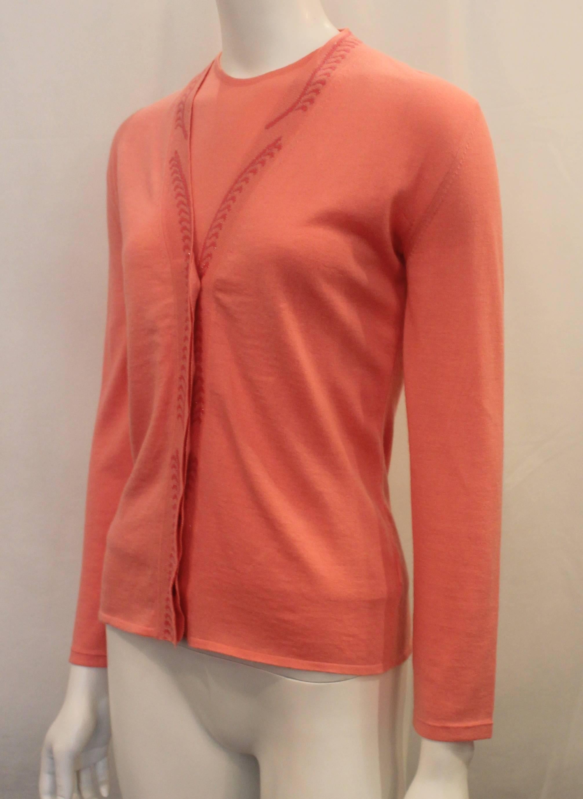 Emilio Pucci Coral Cashmere Blend Sweater Set - XS - 1990's. This beautiful set is a cashmere-cotton blend. The top is sleeveless and has a round neckline. The cardigan has buttons and a trim of dark pink and silver in a vine design. Both pieces are