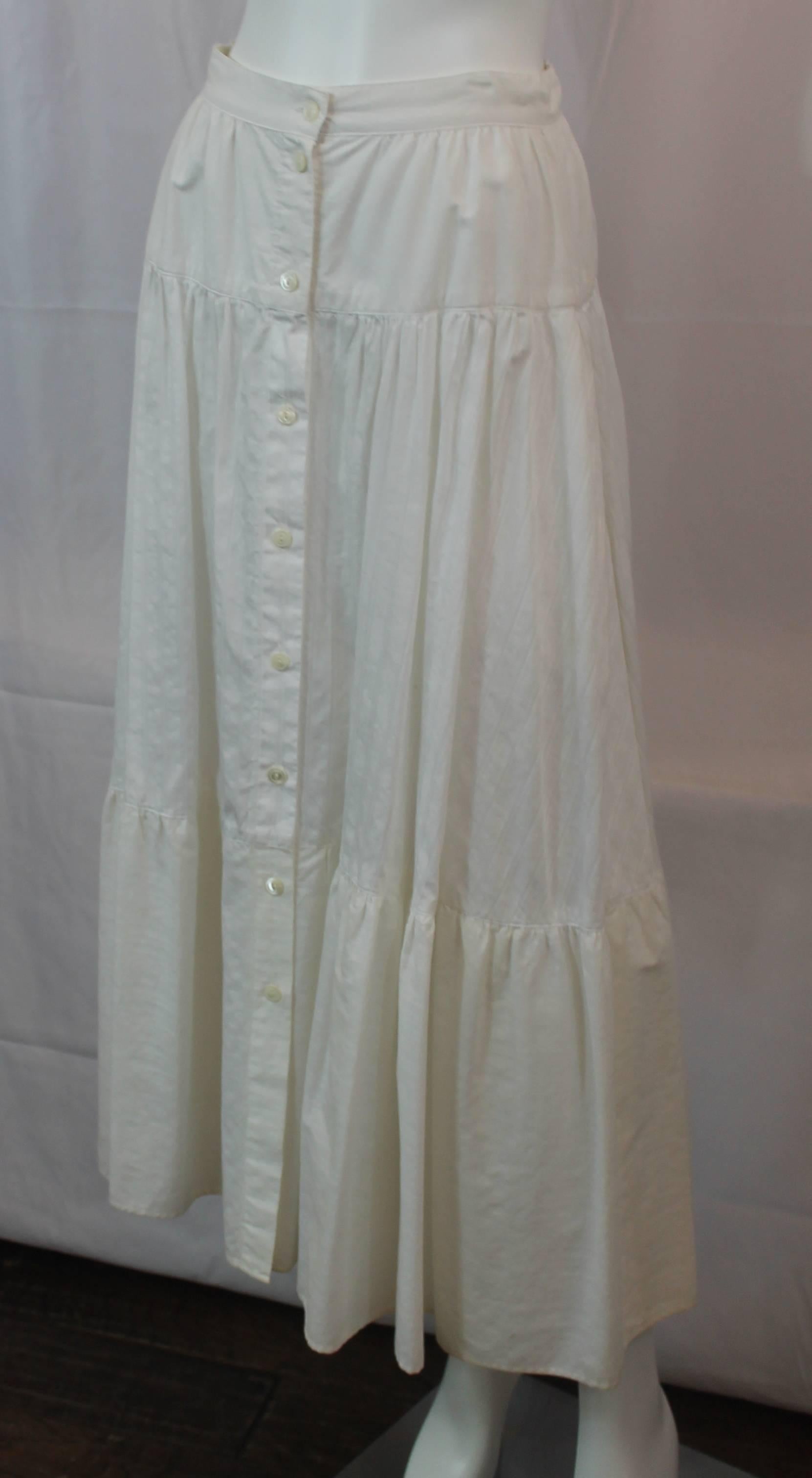 Ralph Lauren Country Off White Cotton Peasant Style Maxi Skirt - 6 - 1990's. This vintage peasant style maxi skirt has buttons all the way down the front and is an off white color. There are 3 different tiers of fabric and each tier has a different