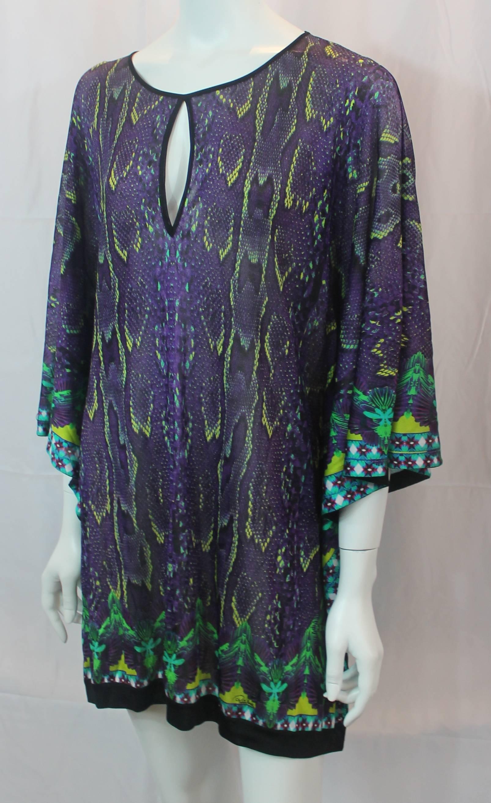 Roberto Cavalli Purple and Lime Snake Printed Knit Oversize Tunic Top - M. This tunic top has a purple and lime snake skin print, a keyhole and side slits, and belt loops. It is in excellent condition but comes with no belt.

Measurements:
Bust: