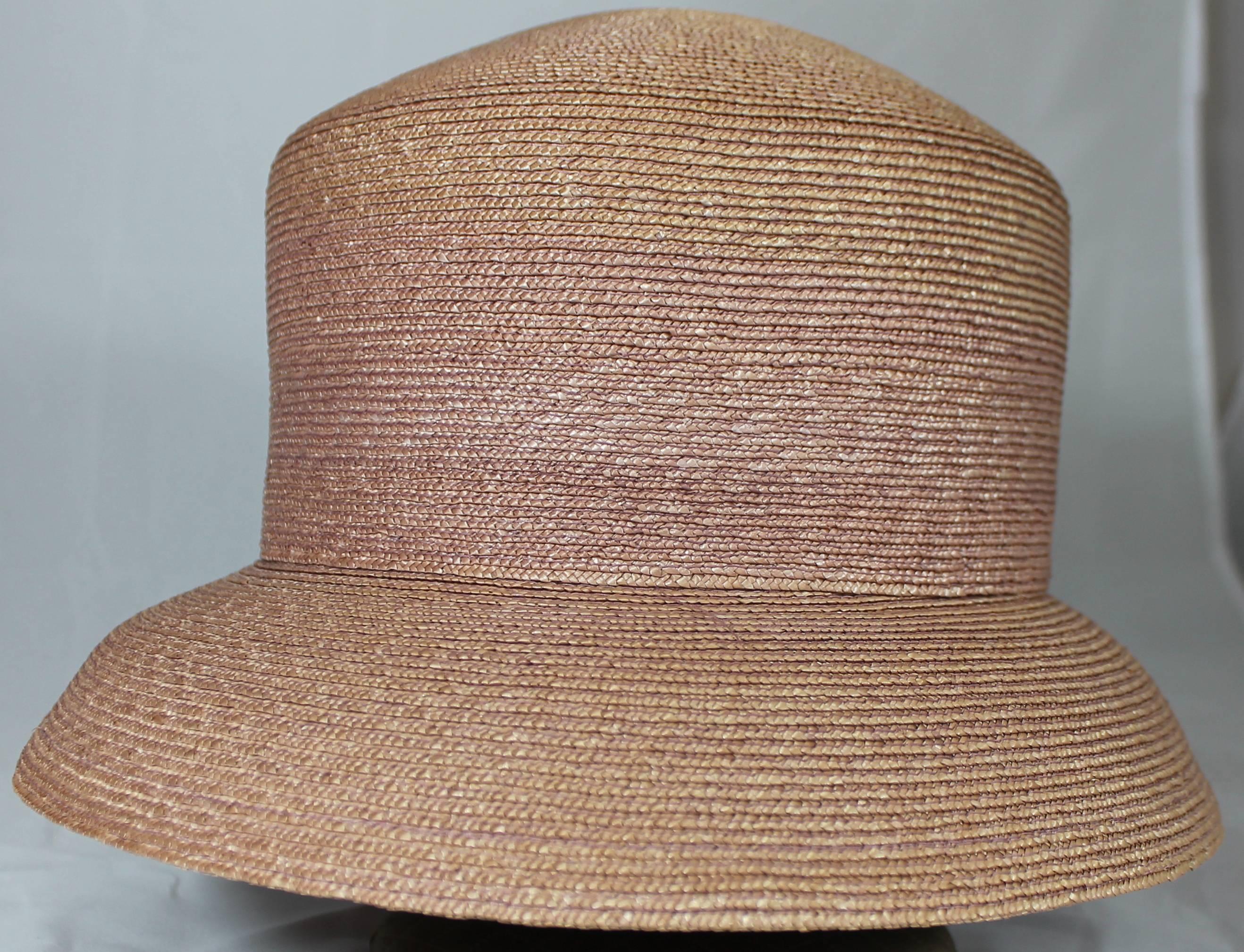 Suzanne Couture Millinery Blush Straw Hat. This hat is a rosy blush color. It is in excellent condition. 

Measurements:
Circumference: about 20.75
