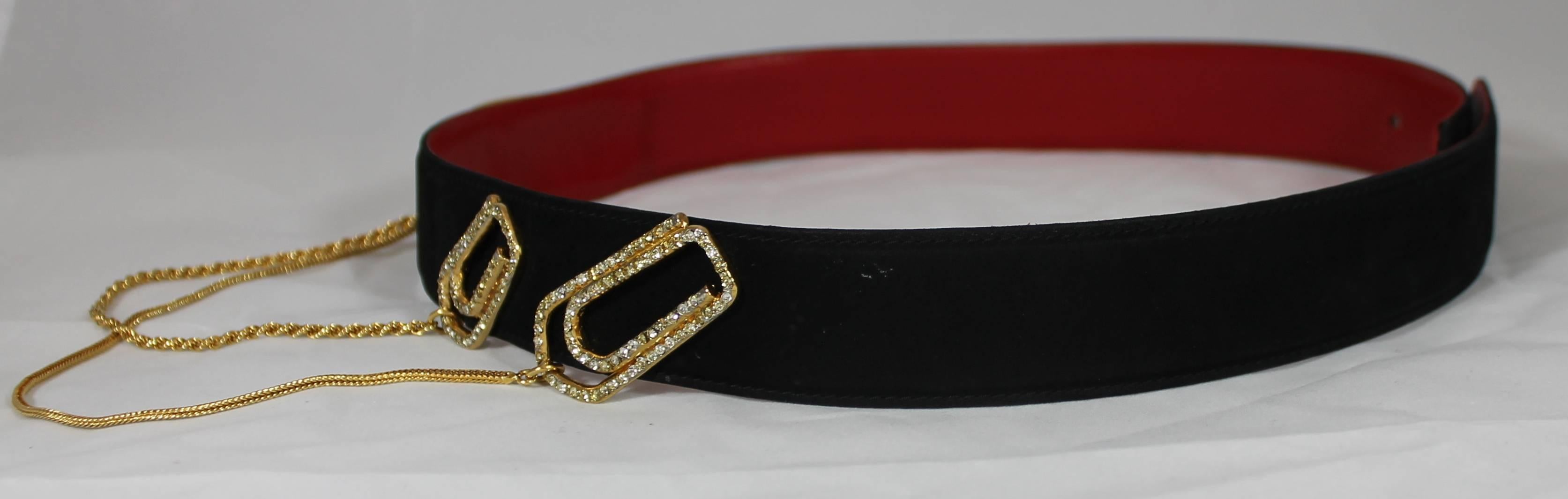 Valentino Couture Black Suede Belt with Gold Chains and Rhinestone Paperclips. This artistic and vintage belt is black suede with a red interior. It has a clip closure in the back. In the front there are 3 rhinestone covered paperclip decorations