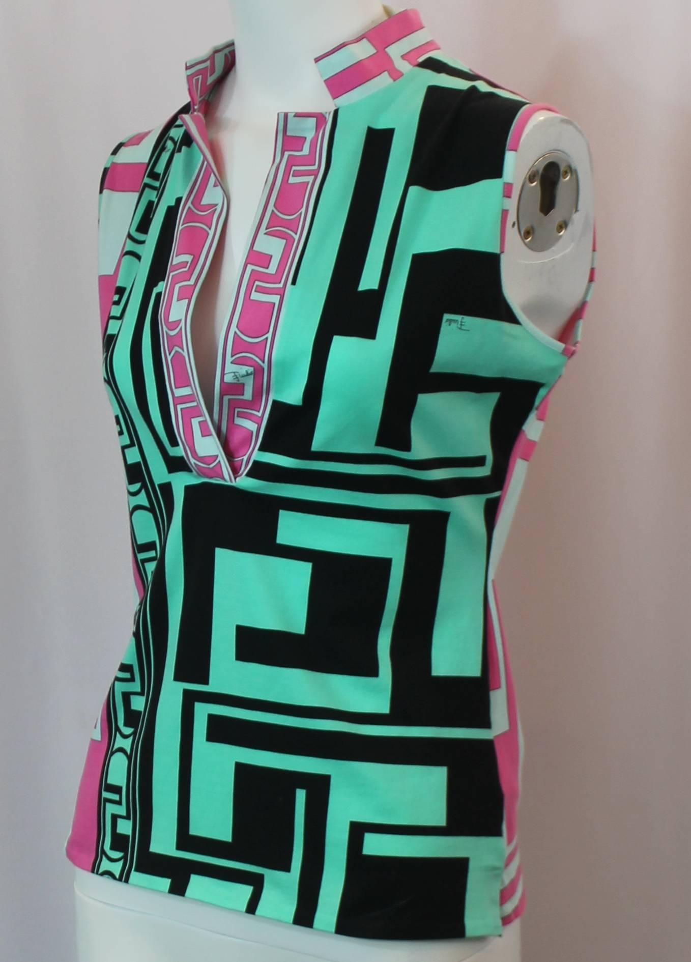 Emilio Pucci Multi-Colored Cotton-Elastin Sleeveless Collared Top - 6. This fun top has a deep v-neck, a collar, and is sleeveless. It features a teal, pink, and black geometric print. It is in excellent condition with very light