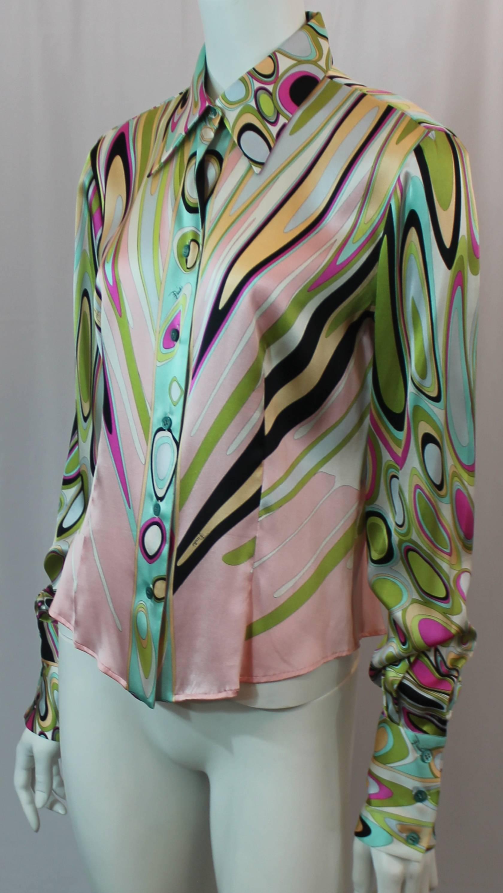 Emilio Pucci Multi-Colored Silk Shimmery Printed Long Sleeve Button Down Shirt - 12. This fun shirt is silk and has a shimmery geometric design with many colors suck as pinks, blue, green, and black. It is in excellent