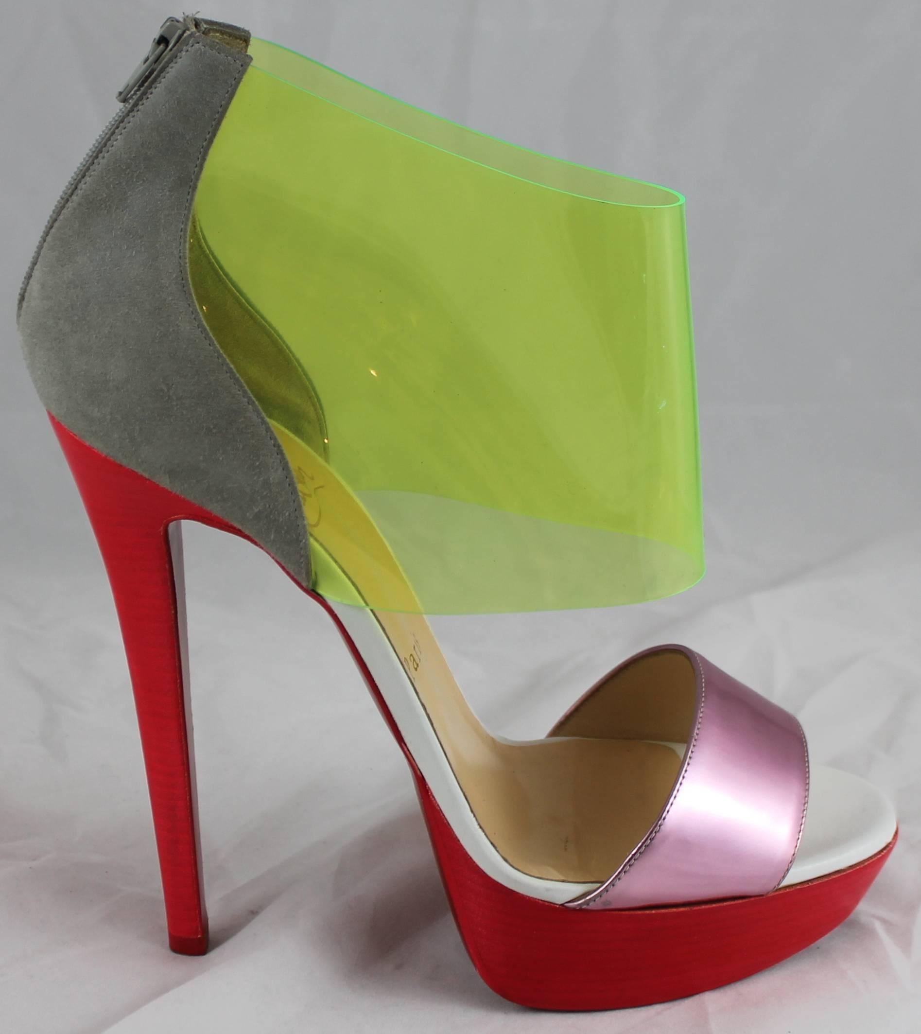 Christian Louboutin Multi Color Suede, Jelly & Leather Cutout Heels - 37.5. These shoes are in excellent condition with minor general wear and some minor wear specifically on the platform and heel as shown in the images. These unique shoes are a