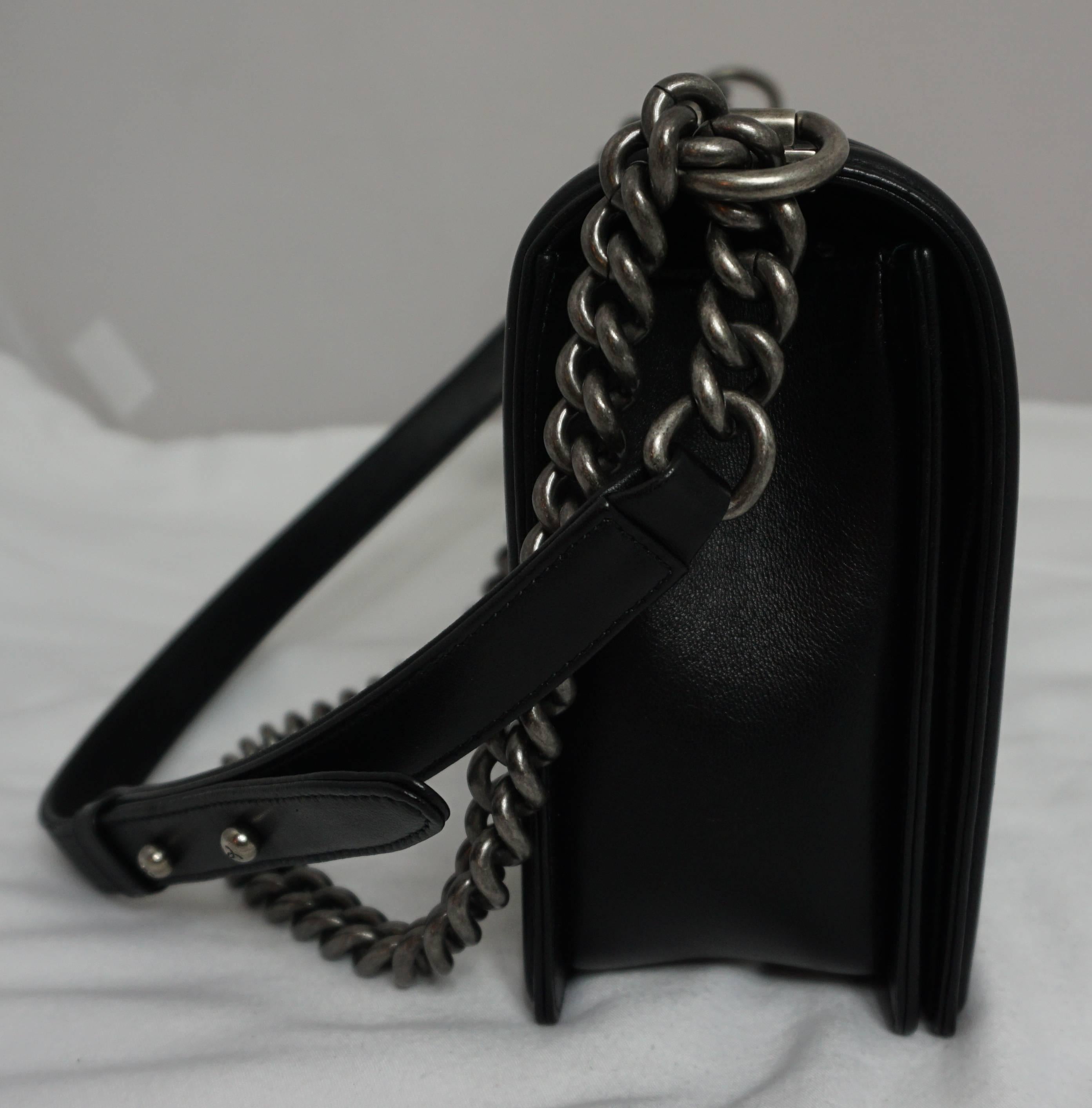Chanel Black Lambskin New Medium Boy Bag - PHW- Circa 2014  This is the 