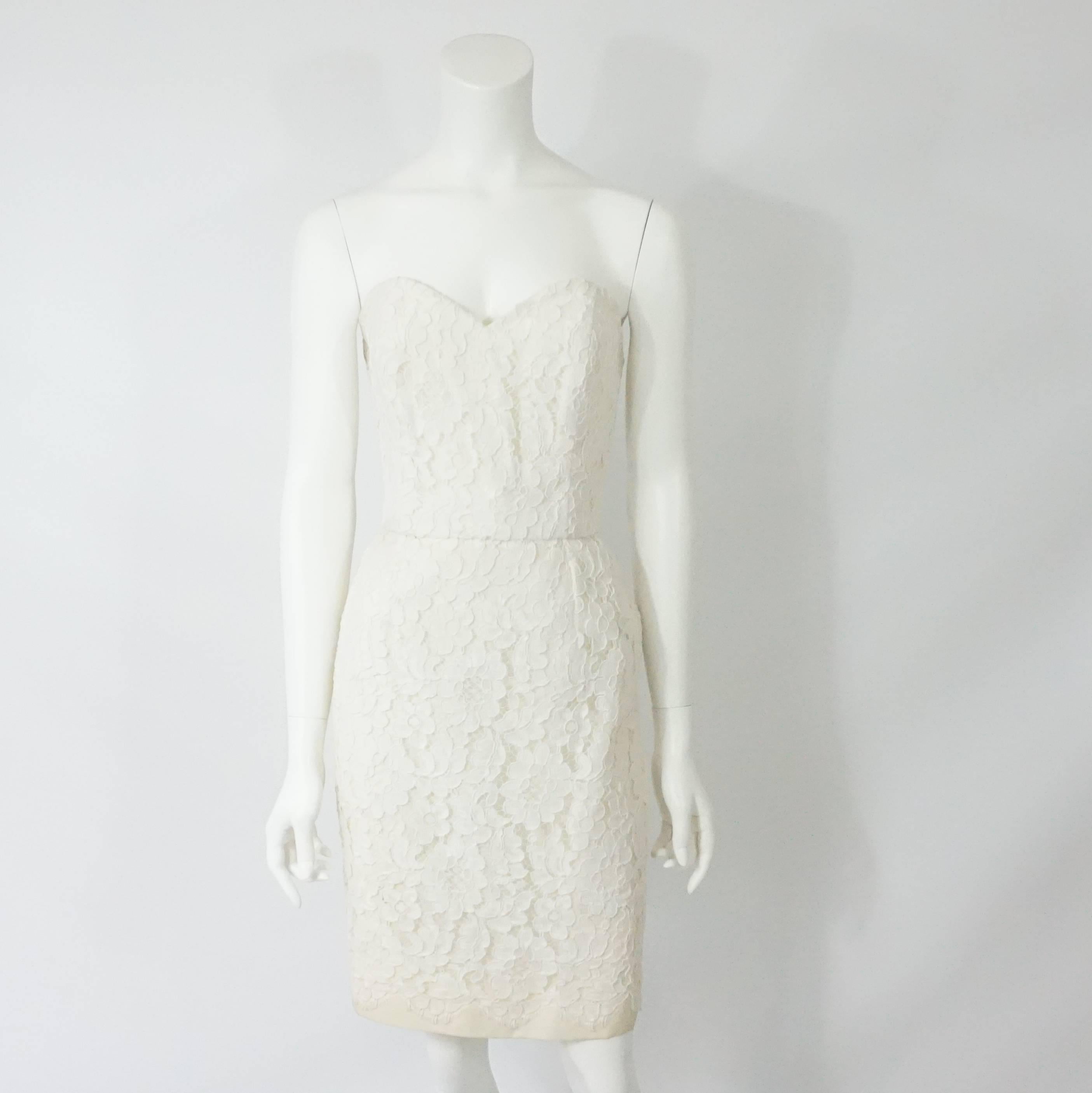 Tomasz Starzewski Ivory Soutache Lace Strapless Dress w/ Jacket-12-90's  This perfect vintage summer piece is made of a beautiful soutache lace, the dress is strapless and the cropped bolero jacket has 3 large black enamel and rhinestone buttons.