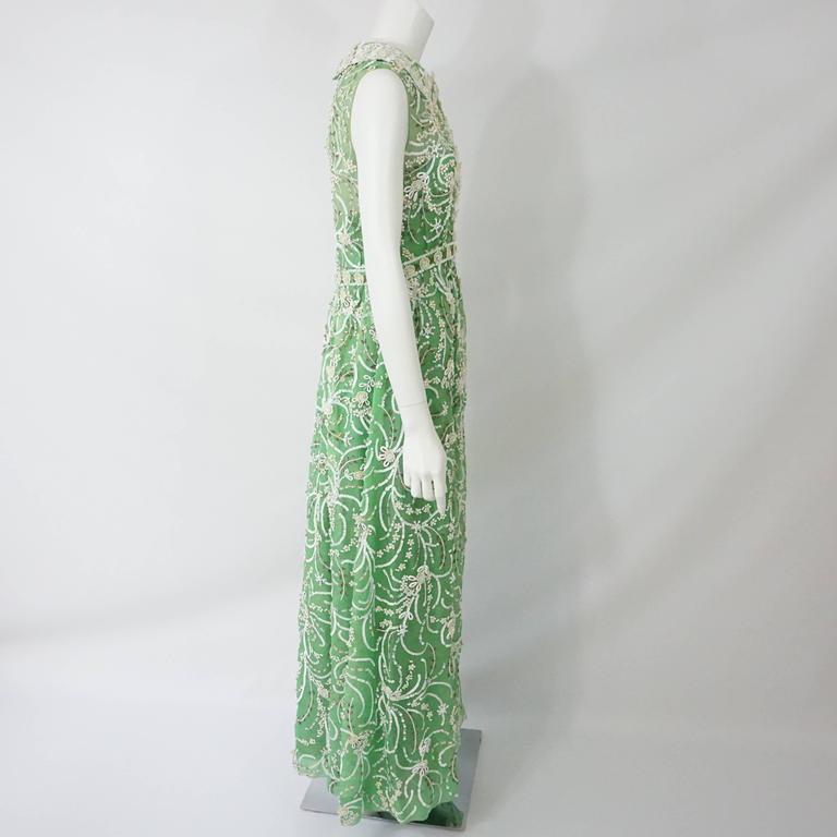 Malcolm Starr Heavily Beaded Green Silk Organza Gown - 8- Circa 70's This Elinor Simmons for Malcolm Starr creation is fabulous. This gorgeous green silk organza fabric is all hand beaded in white and beige design throughout the entire garment. It