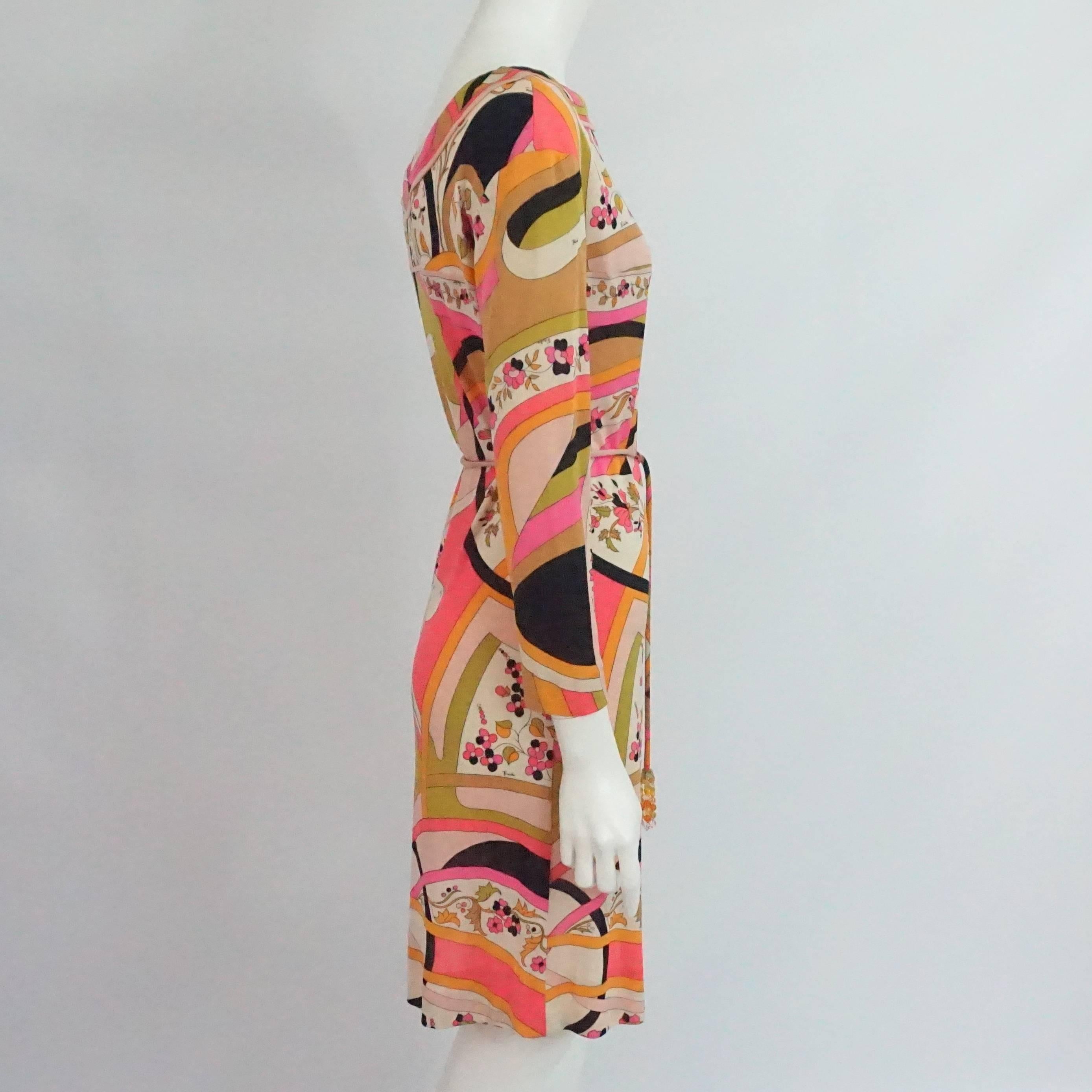 Emilio Pucci Multi Silk Jersey Geometric Print Dress with Belt - 8 - 1960's. This timeless dress is a great pop of color for tropical trip to warm weather. It features a geometric & floral print, bracelet sleeve, drop sleeves, tapered fit, and thin