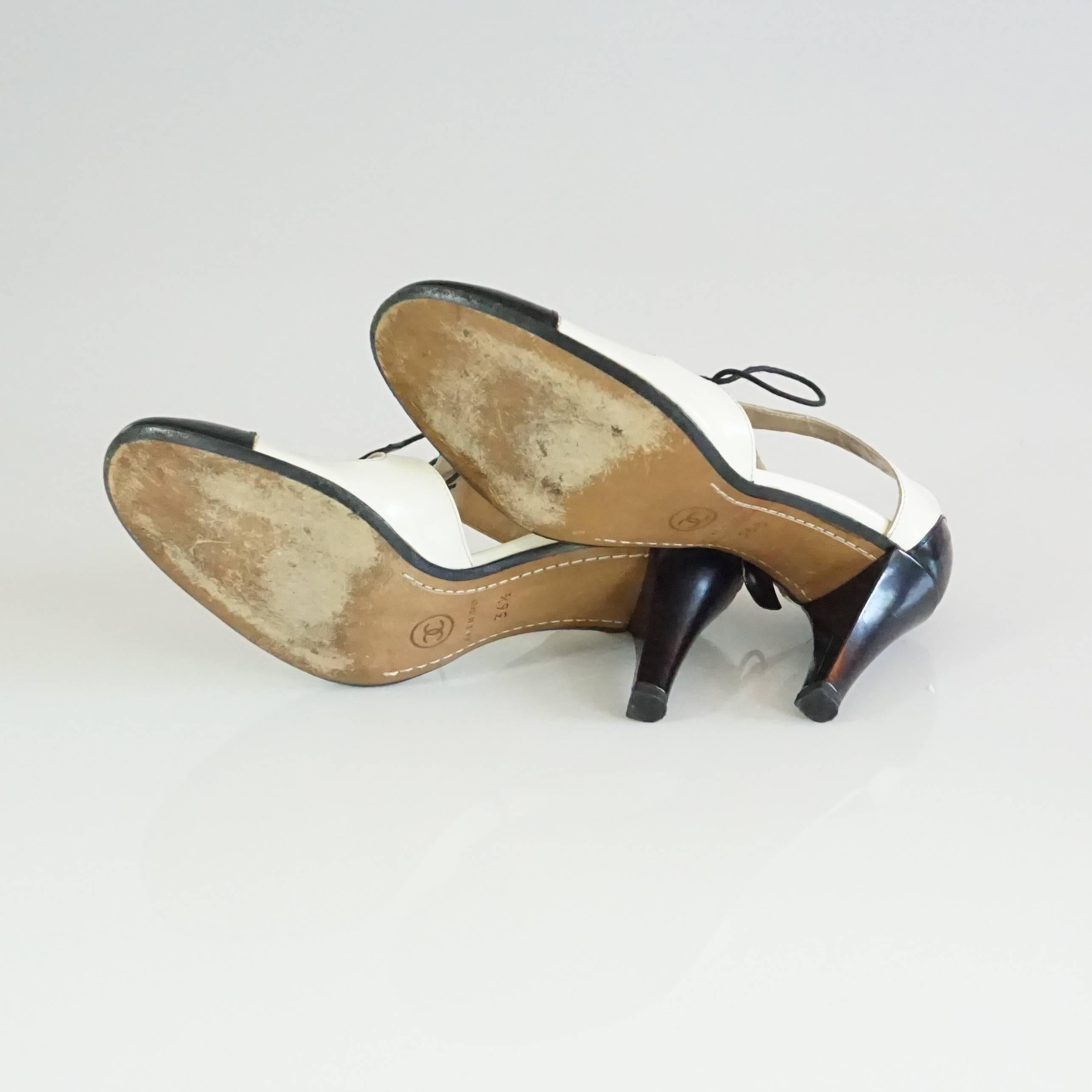 Chanel Ivory & Black Patent Oxford Style Cutout Heels - 36.5 In Good Condition In West Palm Beach, FL