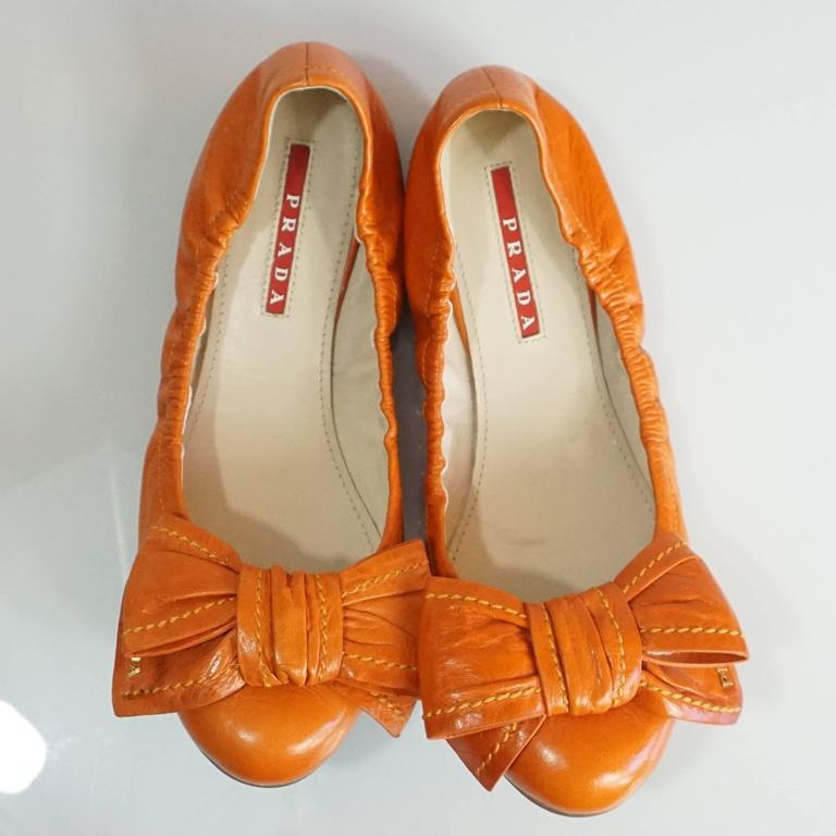 prada flats with bow