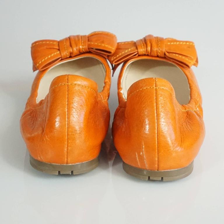 orange leather flats