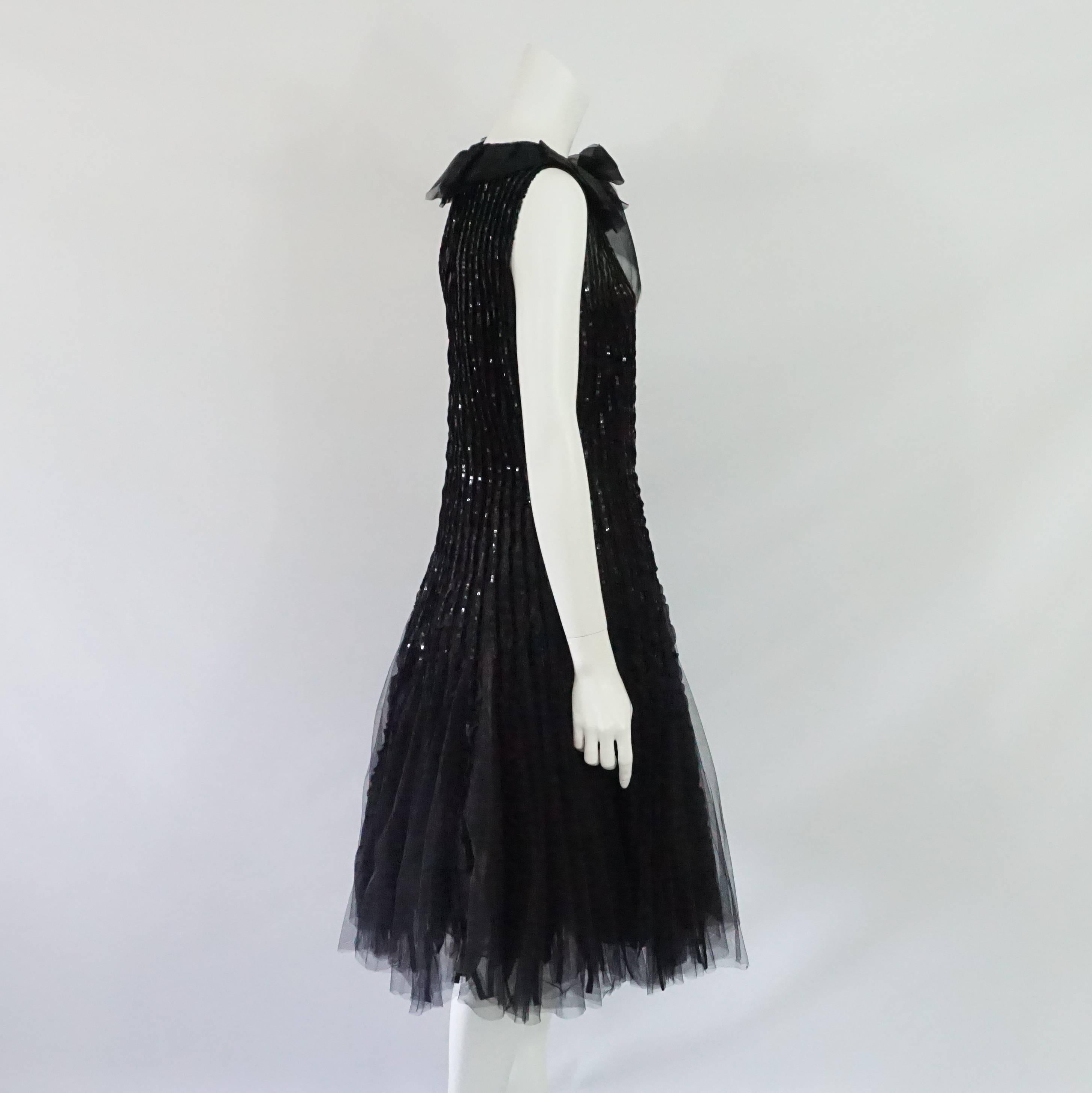 Oscar de la Renta Black Tulle, Velvet & Sequin Evening Dress - 12. This dress is a true showstopper and takes 