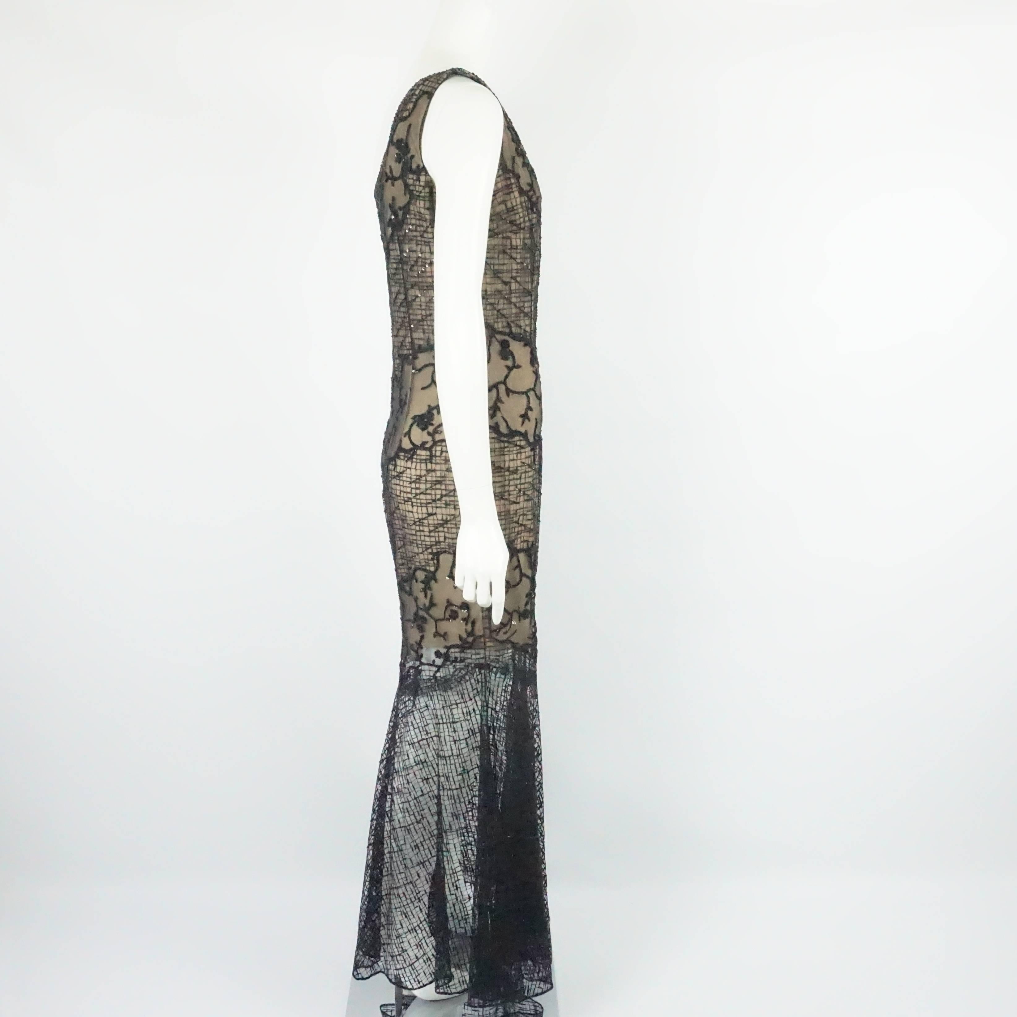 Oscar de la Renta Black Lace One Shoulder beaded Gown-10-Circa 90's This beautiful one shoulder beaded black lace gown has a nude color silk lining only up to the knee, and the bottom part of the gown is unlined and see through giving it a very