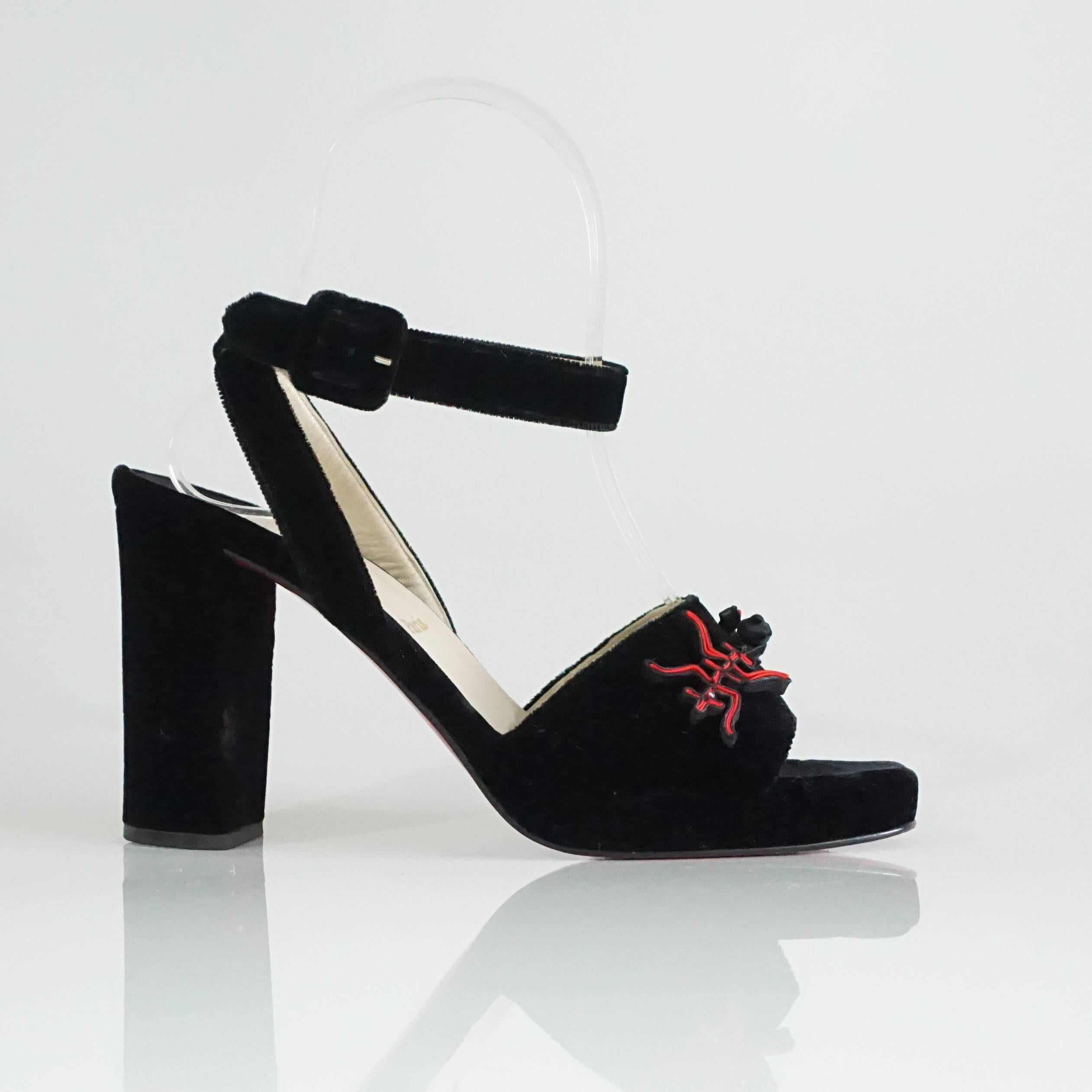 Christian Louboutin Black Velvet Ankle Strap Sandal with Chunky Heel w. red and black satin Asian theme Decorative detail on the front-37 This beautiful and very in style evening sandal is a true collectors dream. The front strap is 2