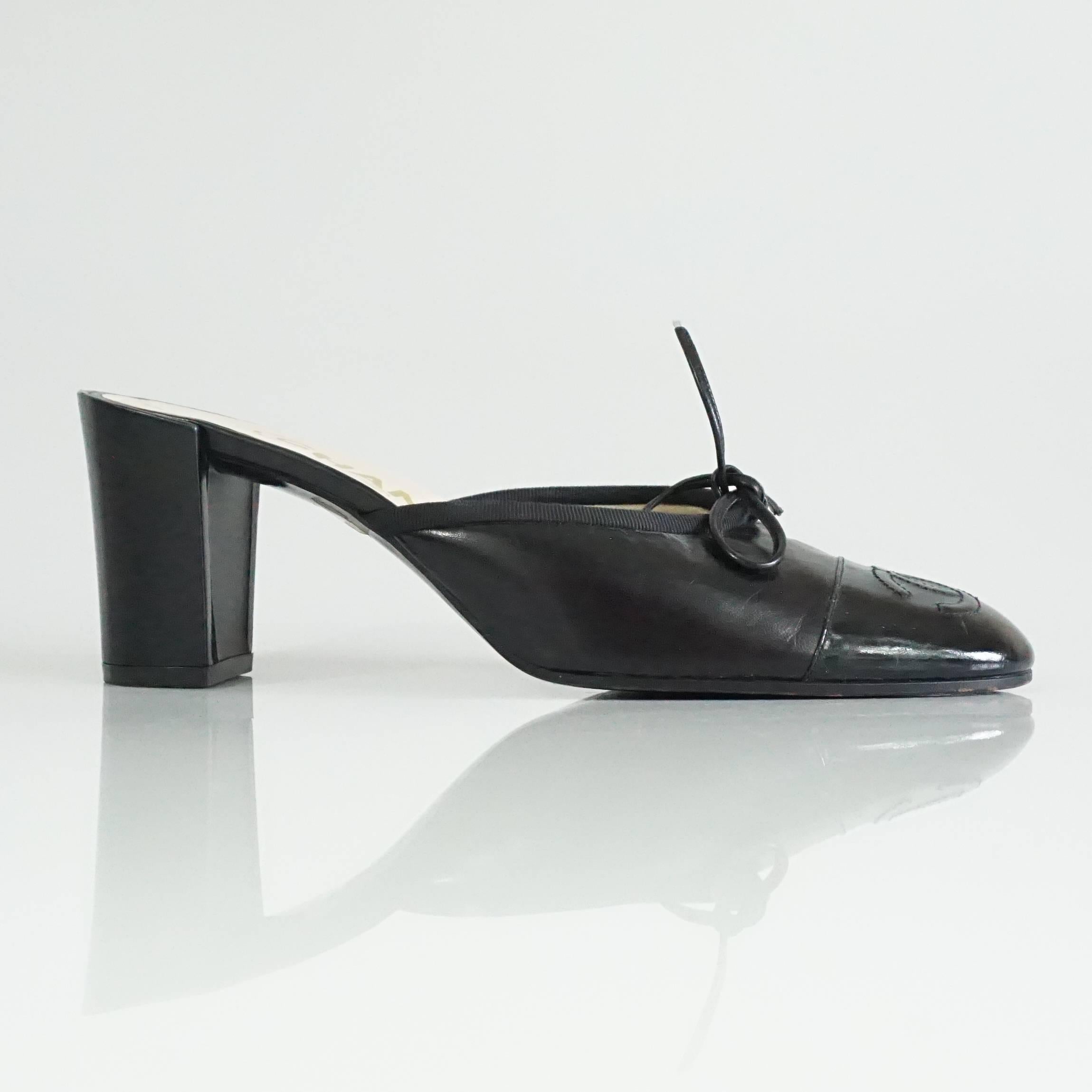 Chanel Black Ballet Style Leather and Patent Slide w/ Chunky Heel-37.5 This classic Ballet Flat style shoe was given a new look by making it a slide and adding a 3