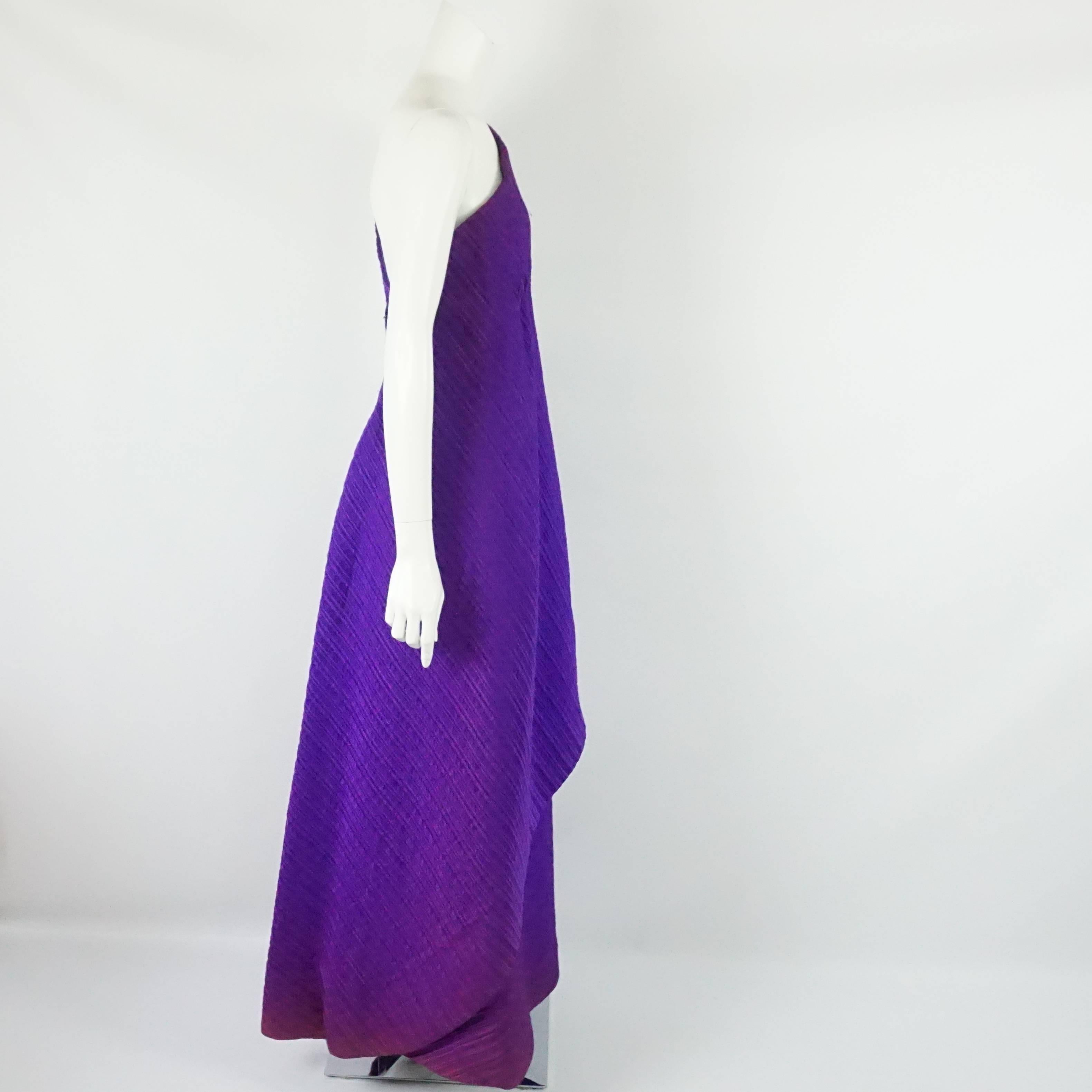 Arnold Scaasi Purple One Shoulder Textured Gown - 8 - 60's This spectacular and unique one shoulder textured gown has a straight fit and an extra layer that comes across the front and has pleated/gathers under the chest area. This gown is in very