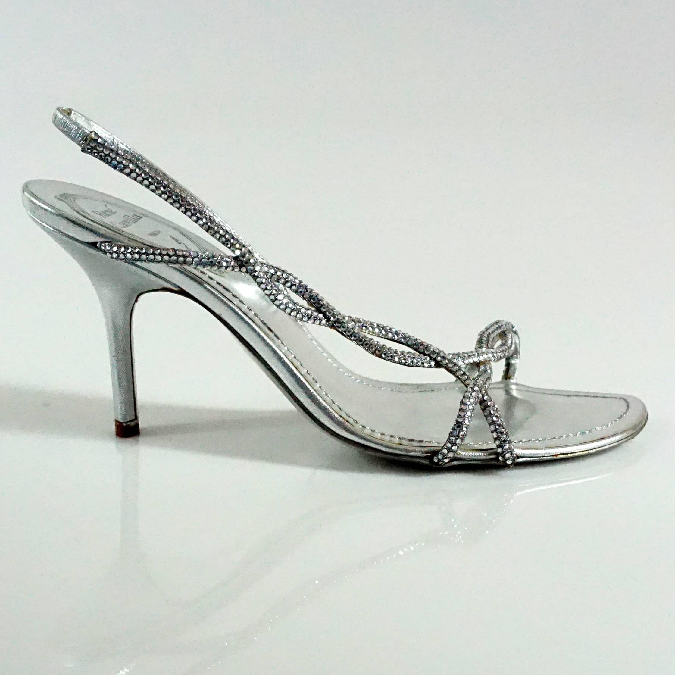 Rene Caovilla Silver Rhinestone Sandals-37  These beautiful sandals are very elegant filled with rhinestones throughout the straps, and have minor wear consistent with age. Heel height 3.5