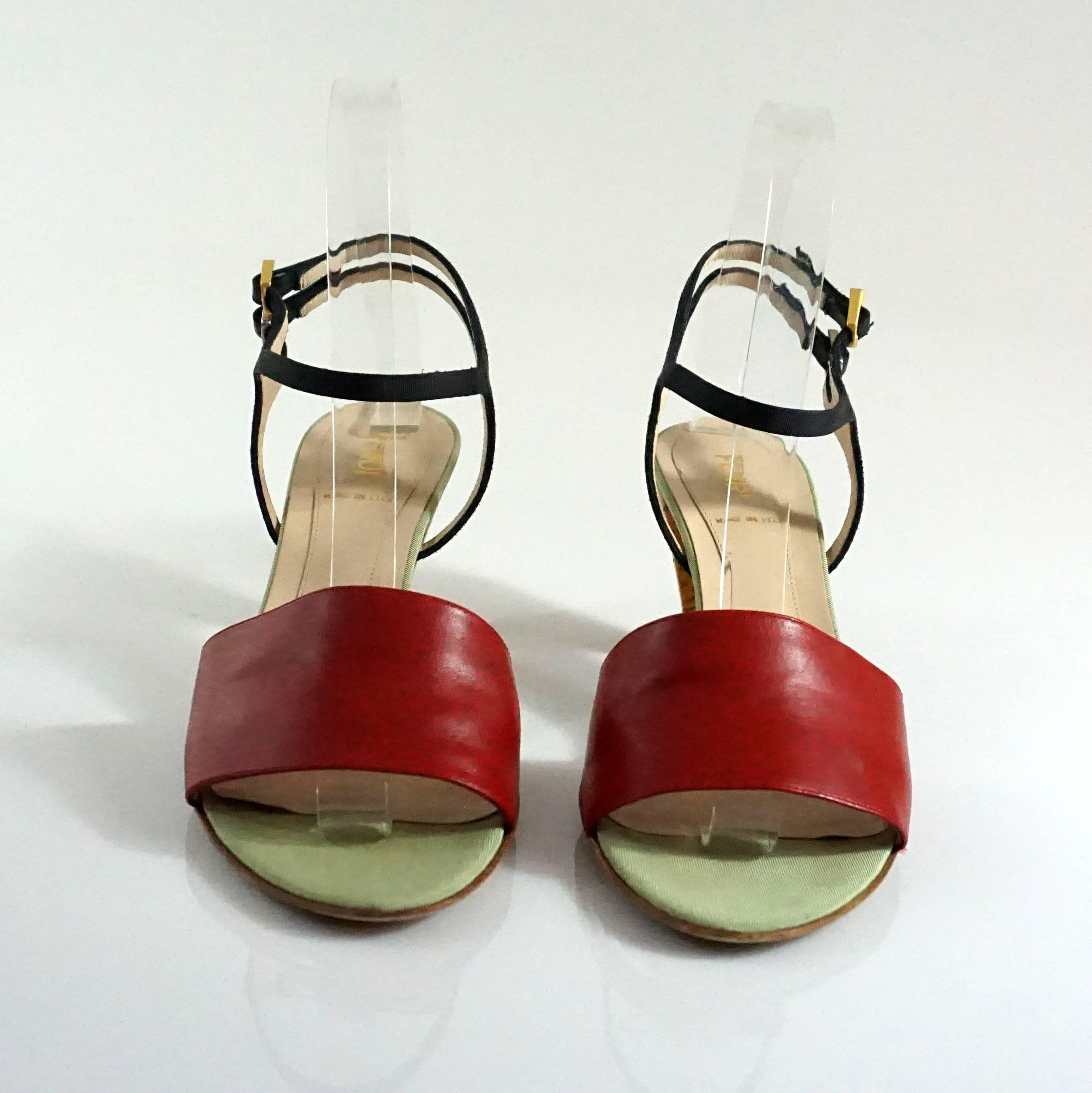 Fendi Black and Red Ankle Strap Sandal w/ Laquer Cork Heel-36.5  This shoe is in excellent condition and has a heel height of 3