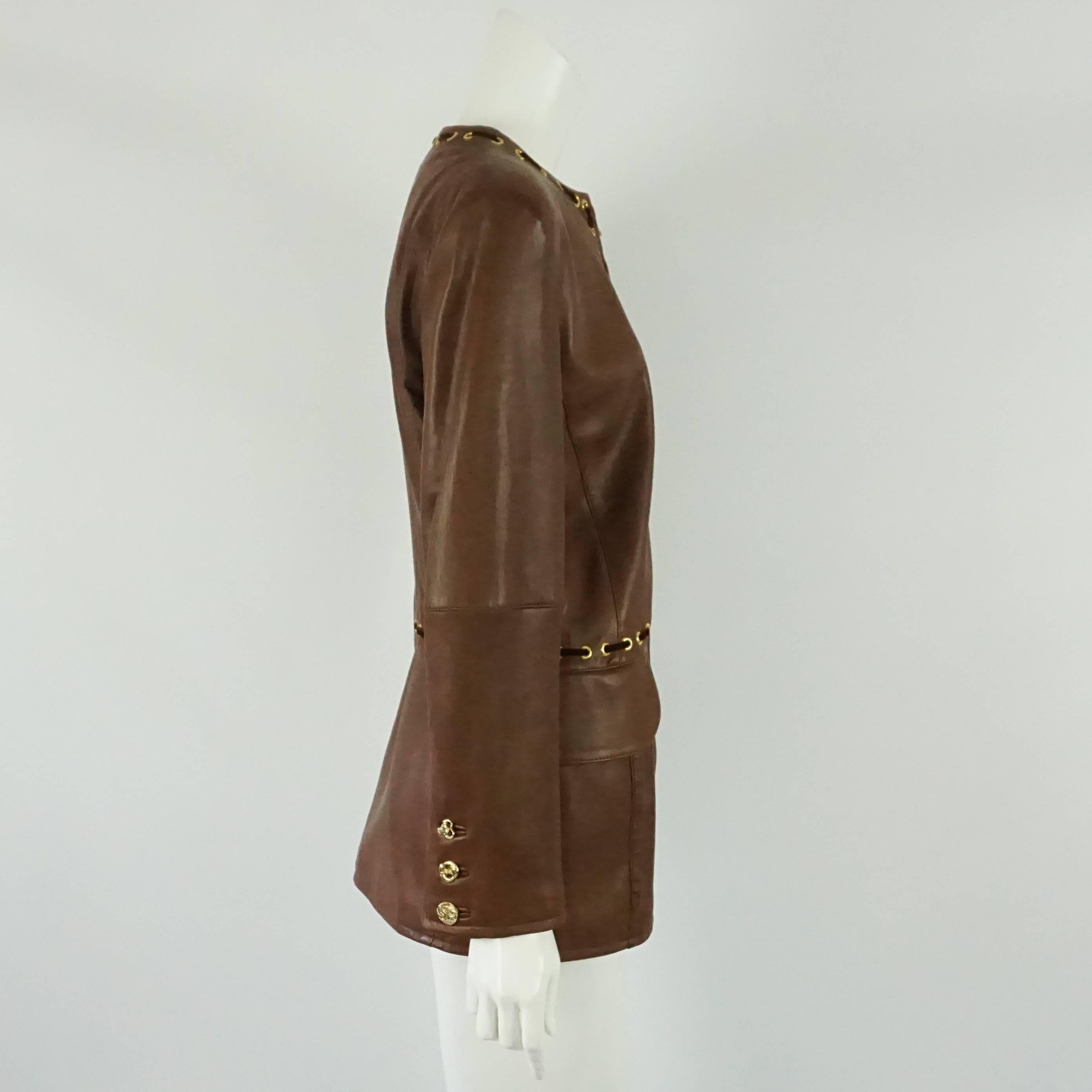 Valentino Boutique Brown Leather Jacket w/ Gold Grommet & Velvet lacing-S-90's  This vintage Valentino Boutique Brown leather jacket has gold grommets throughout the neckline, down the front of the jacket and comming across and around the waistline