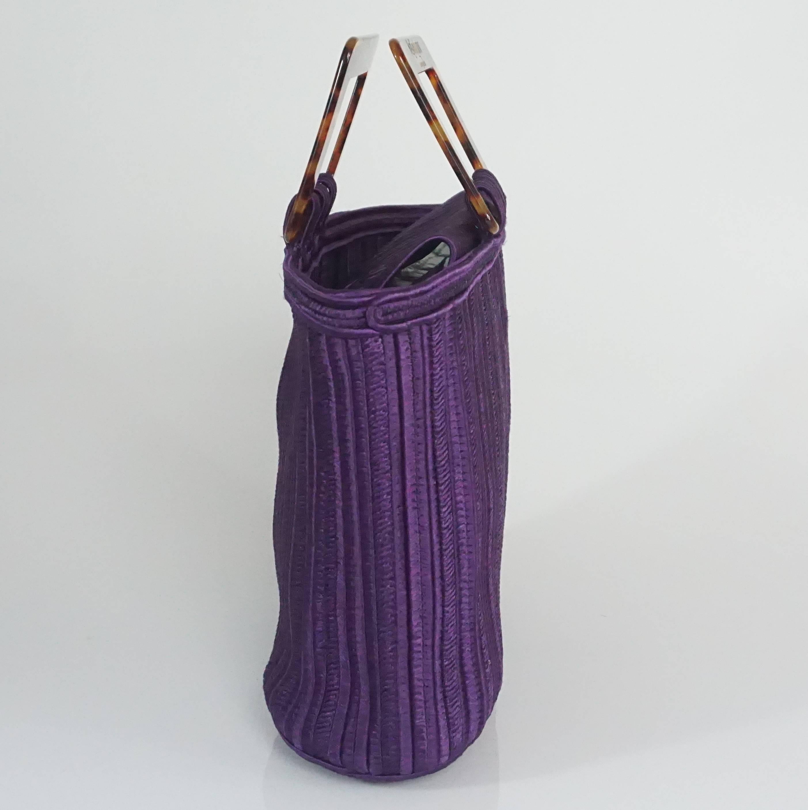Yves Saint Laurent Rive Gauche Purple Passementerie Woven Bag - Circa 90's.This structured, thick, woven bag is purple with a tortoise square handle. The handle  has 