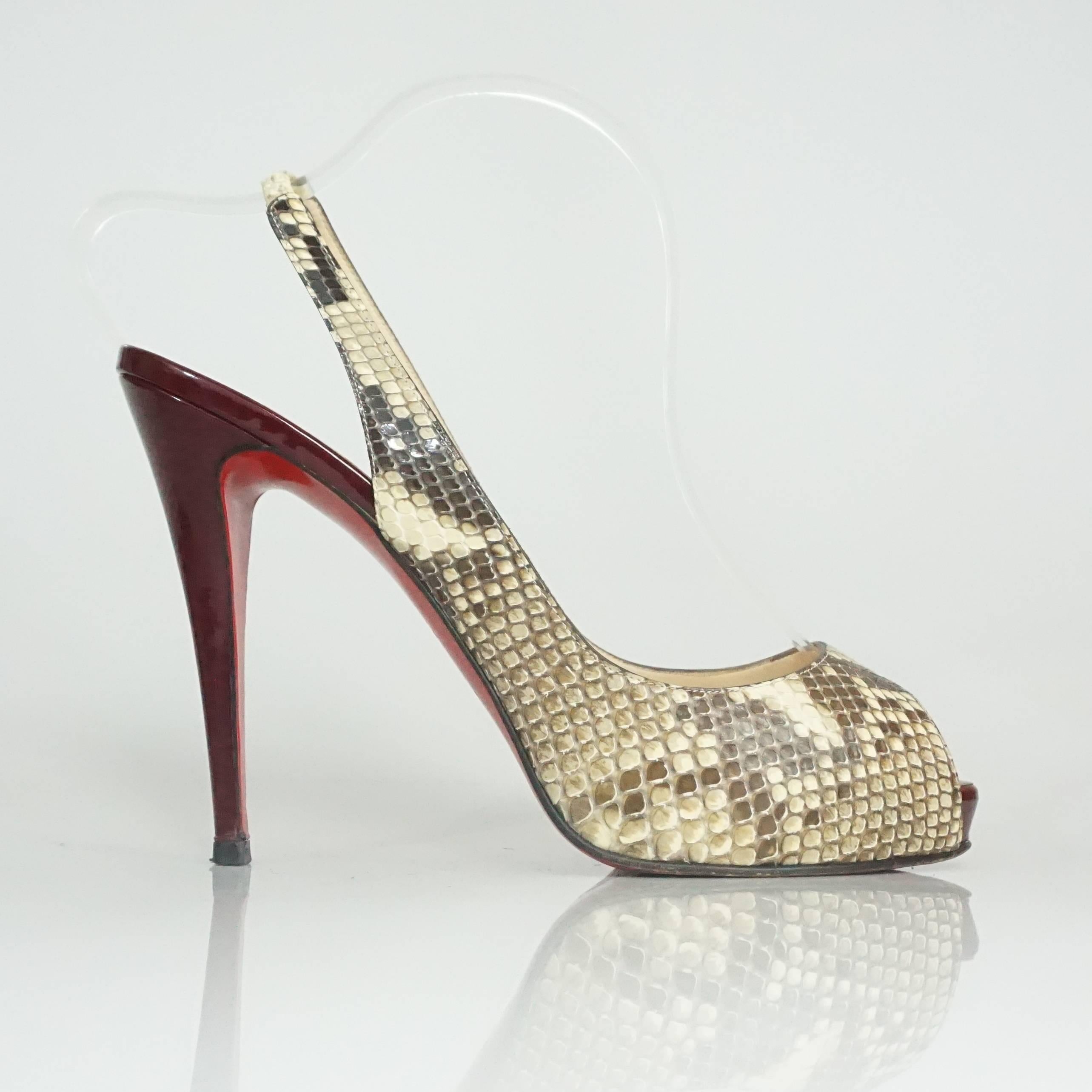 Christian Louboutin Earthtones Snake Peeptoe Slingbacks - 42. These peeptoe slingbacks are made of earthtone colored snake skin. The heels are a burgundy color patent leather  They are in very good condition with some wear on the bottom and a