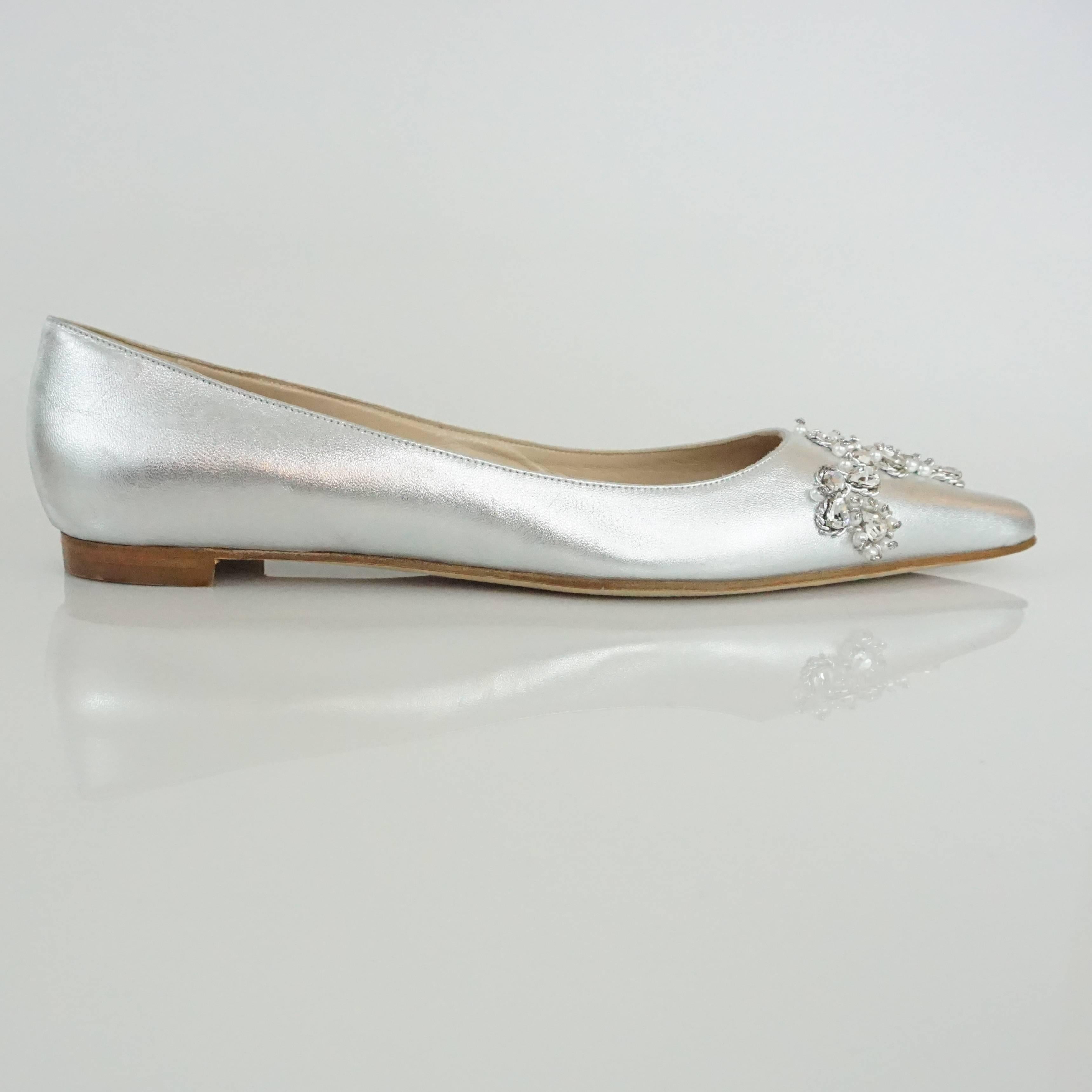 Manolo Blahnik Silver Leather Flats with Rhinestone and Pearl Detail - 40 These beautiful jeweled flats are in new condition. They have a small wood 1/2 inch heel.