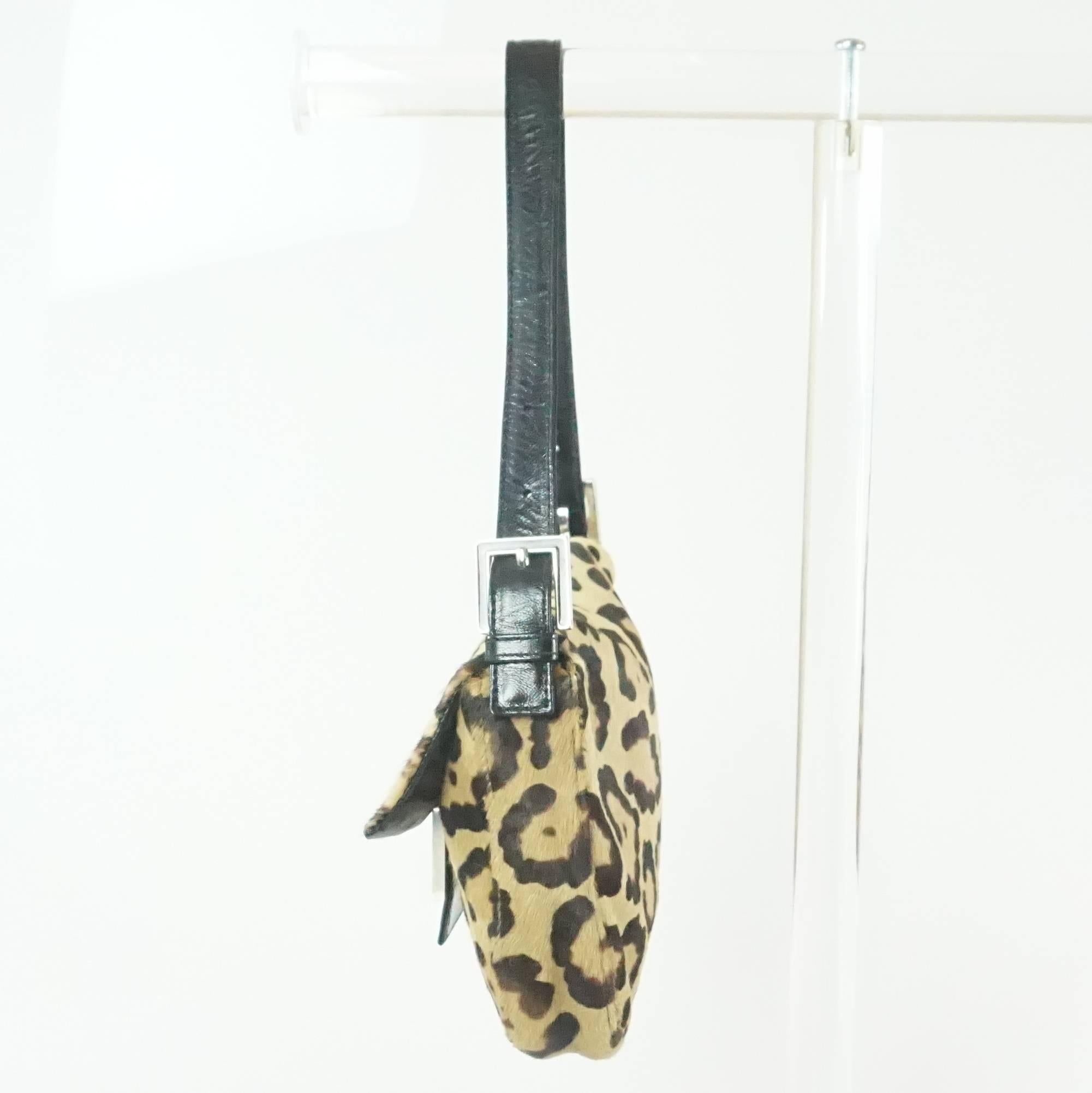Fendi Animal Print Pony Hair and Leather Baguette - SHW. This bag is in excellent condition. It has an enamel logo clasp, black satin lining, and an interior zipper compartment. 

Measurements
Height- 6