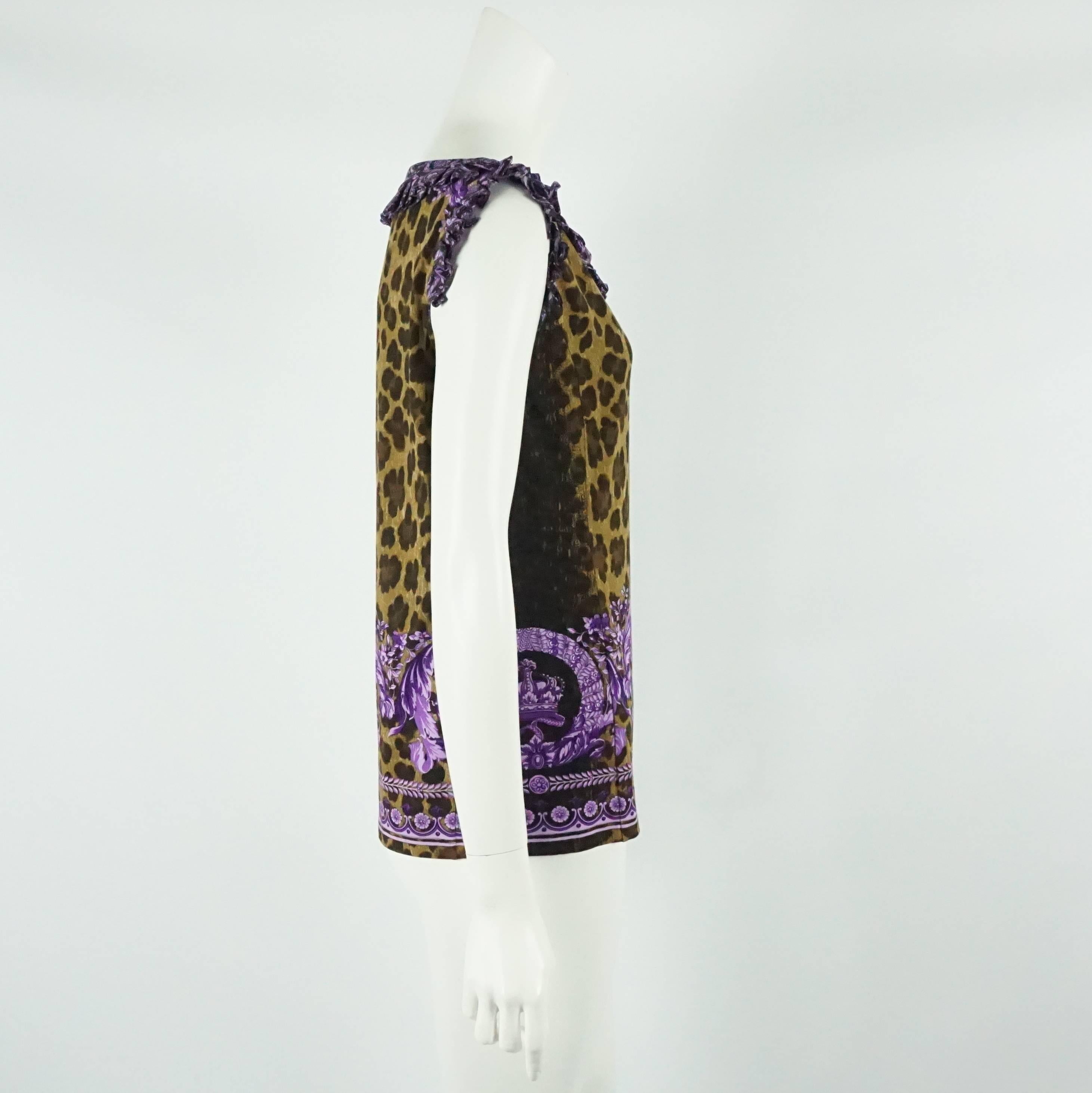 Versace Animal Print and Purple Cotton Top with Ruffles - XL. This top is unique and in excellent condition. It features a regal print on top of the animal print.

Measurements
Bust: 38