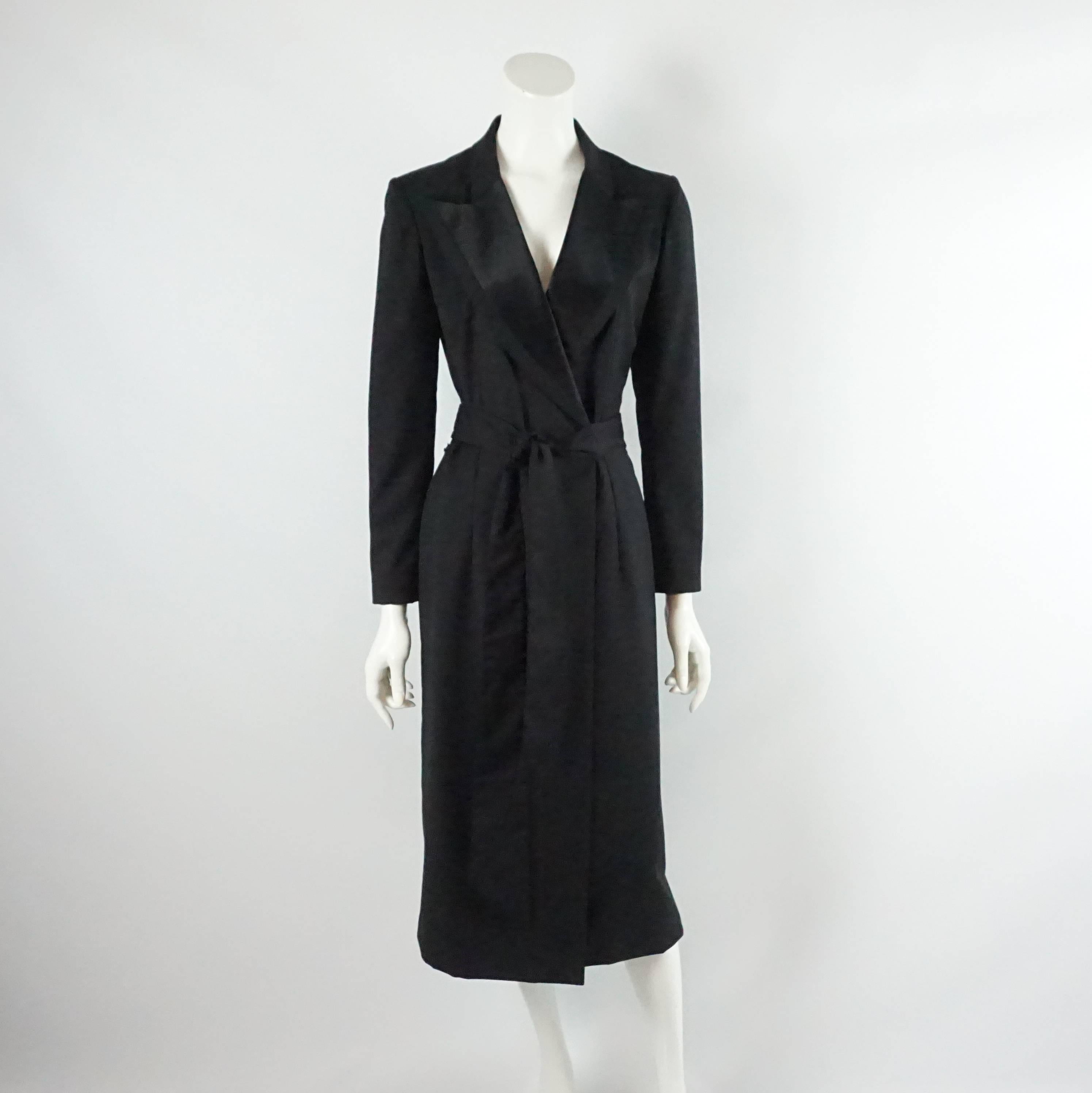 Chloe Black Wool Tuxedo Style Coat with Satin Collar - 38. This coat is a classic show stopper and a very versatile staple. It is a 3/4 length with a tapered fit, wrap style front, and belt. The piece is in very good condition with light wear and