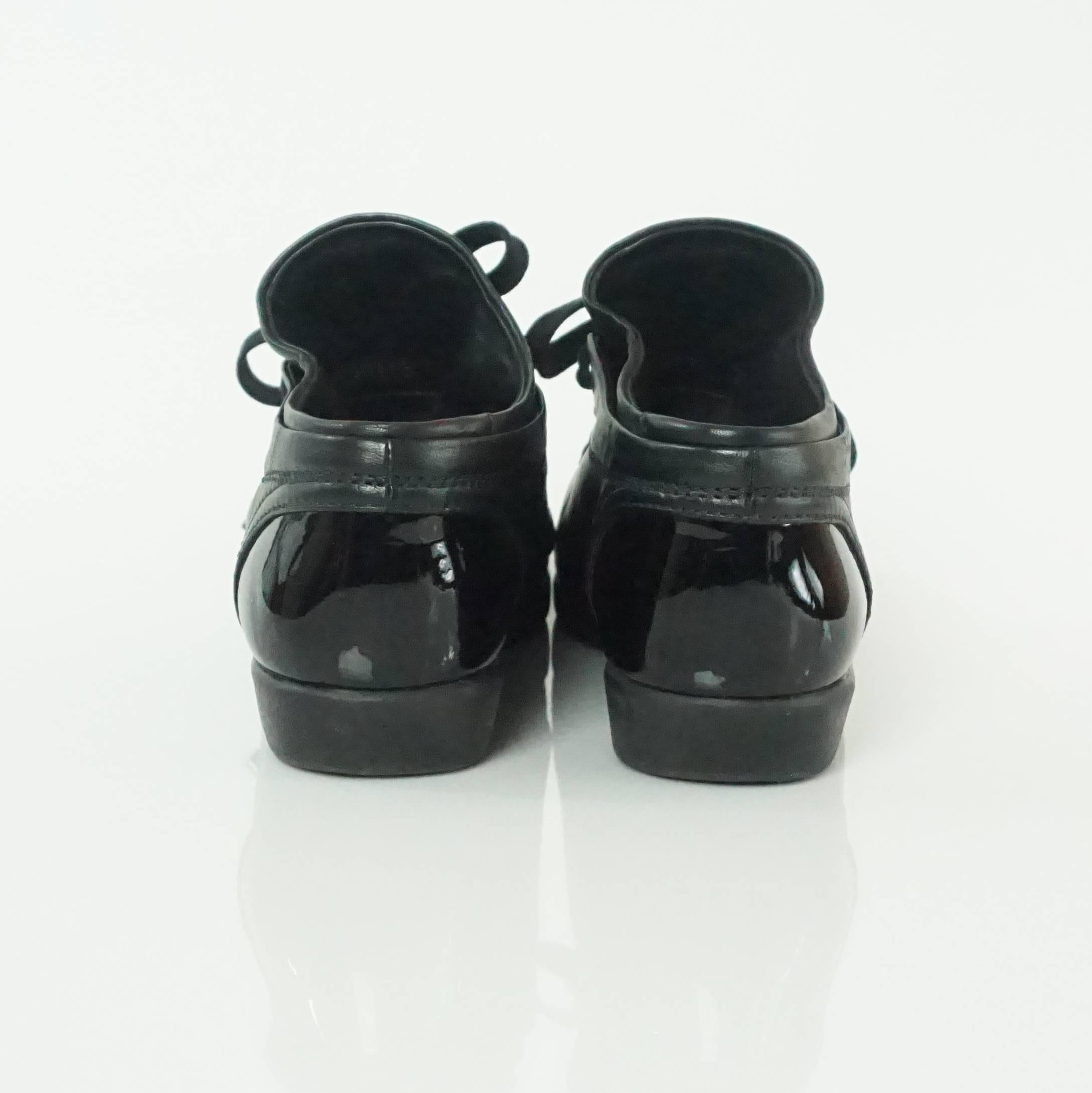 Women's Chanel Black Lambskin and Patent Cap Toe Sneakers - 37.5