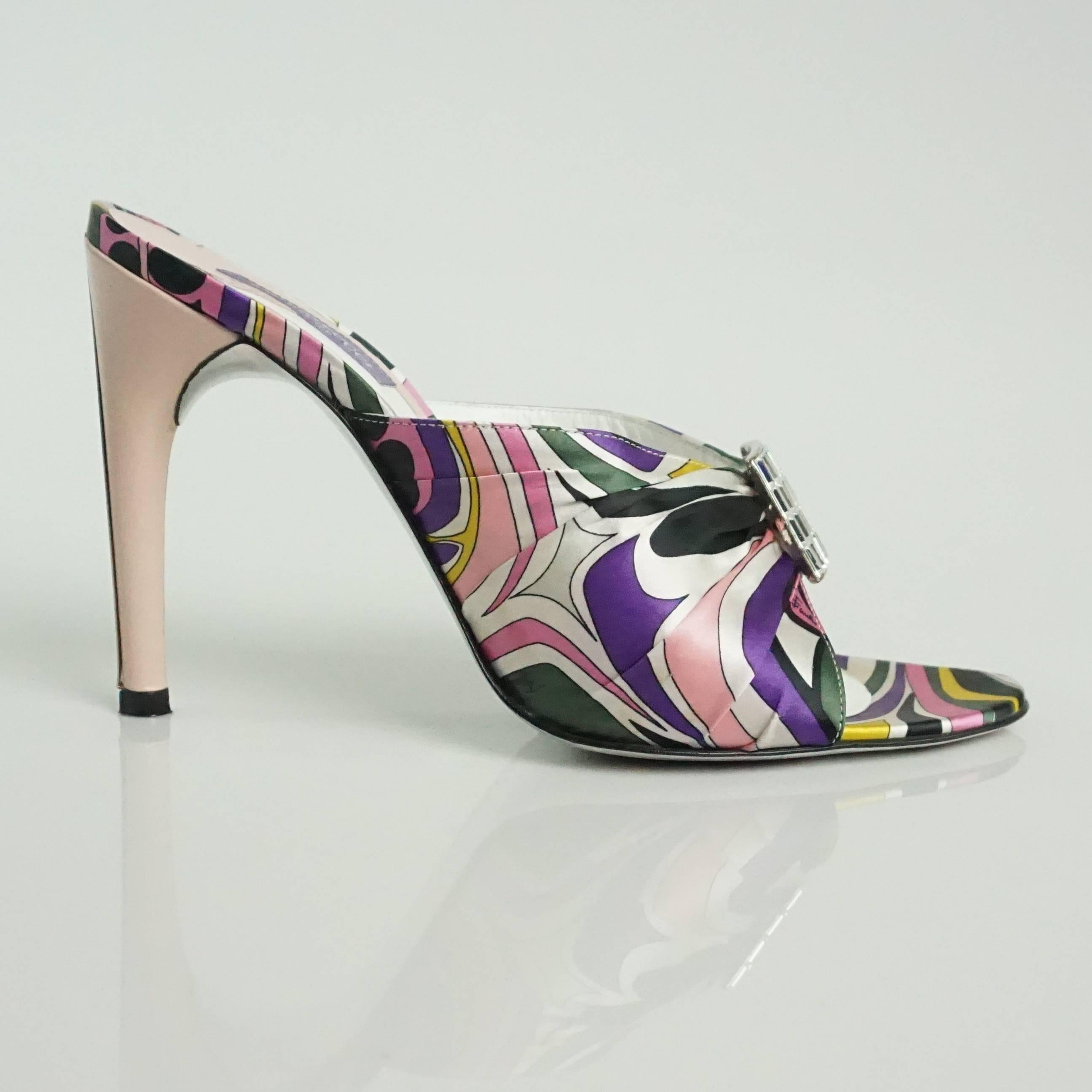 Emilio Pucci Multi Silk Slide with leather heel and rhinestone front detail-37   These spectacular looking Pucci shoes have a pink leather high heel with a silver metal detail with Emilio Pucci etched, they have a silk Pink/Purple/White and Black