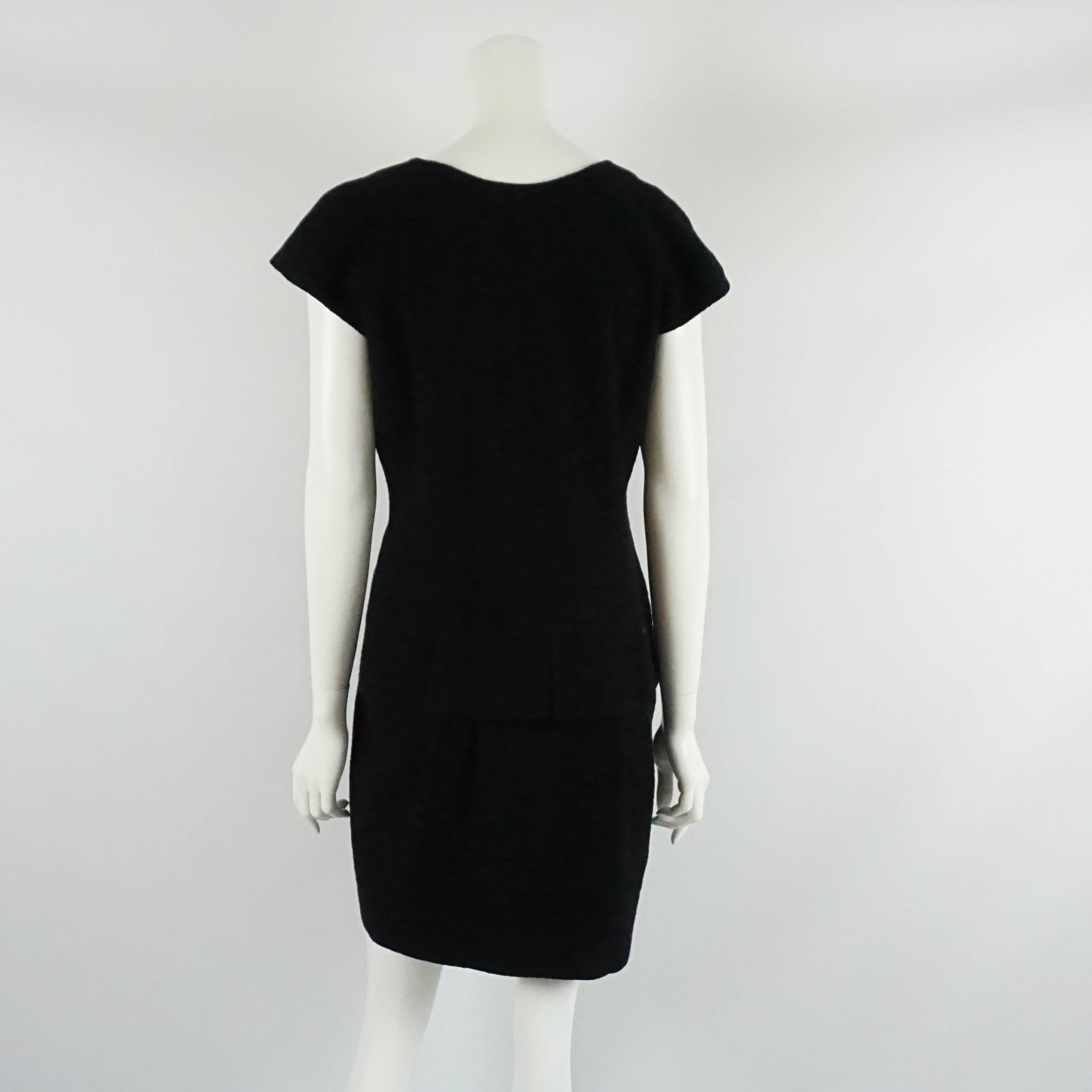 Chanel Black Wool Short Sleeve Dress with Peplum - 44 In Excellent Condition In West Palm Beach, FL