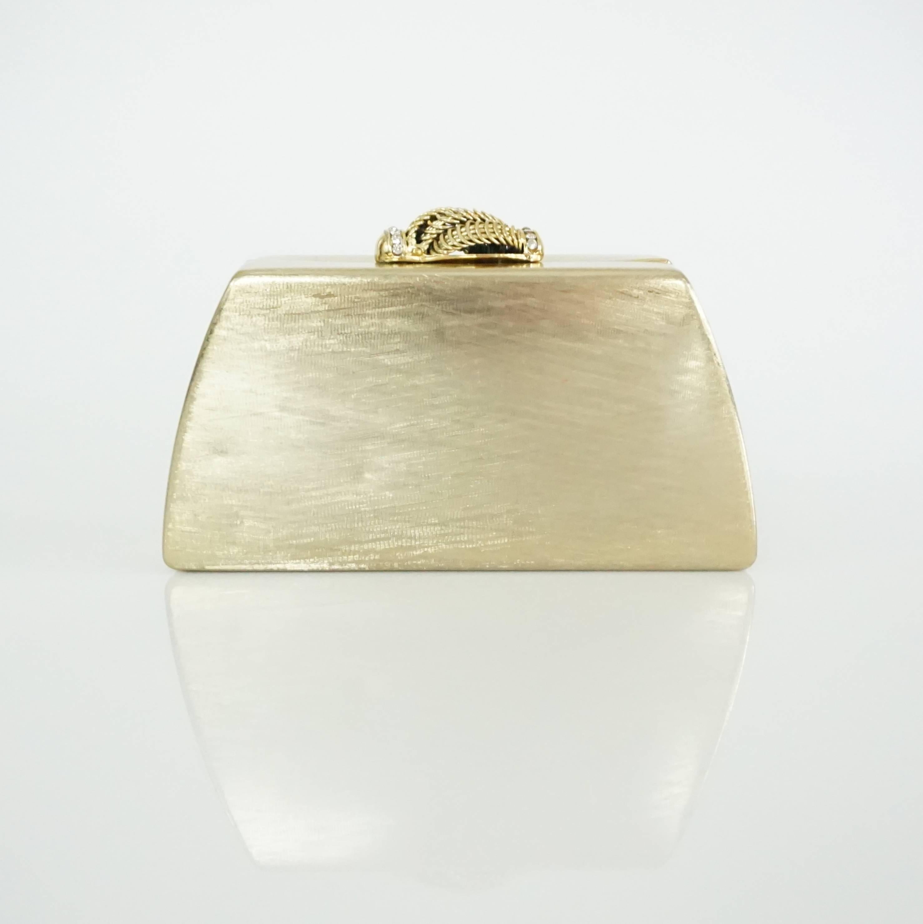 rodo gold clutch