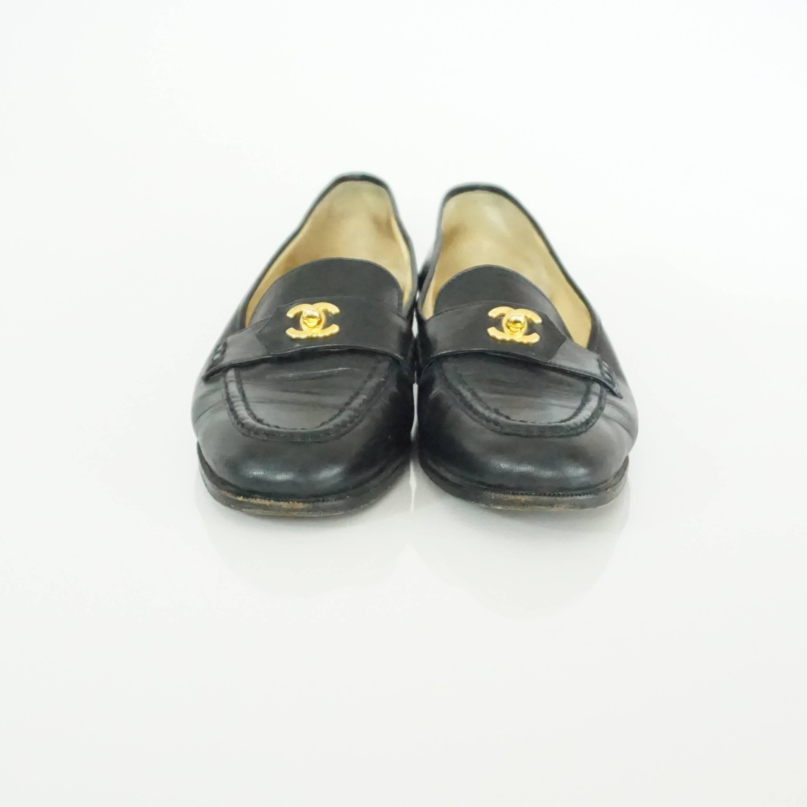 chanel turnlock loafers