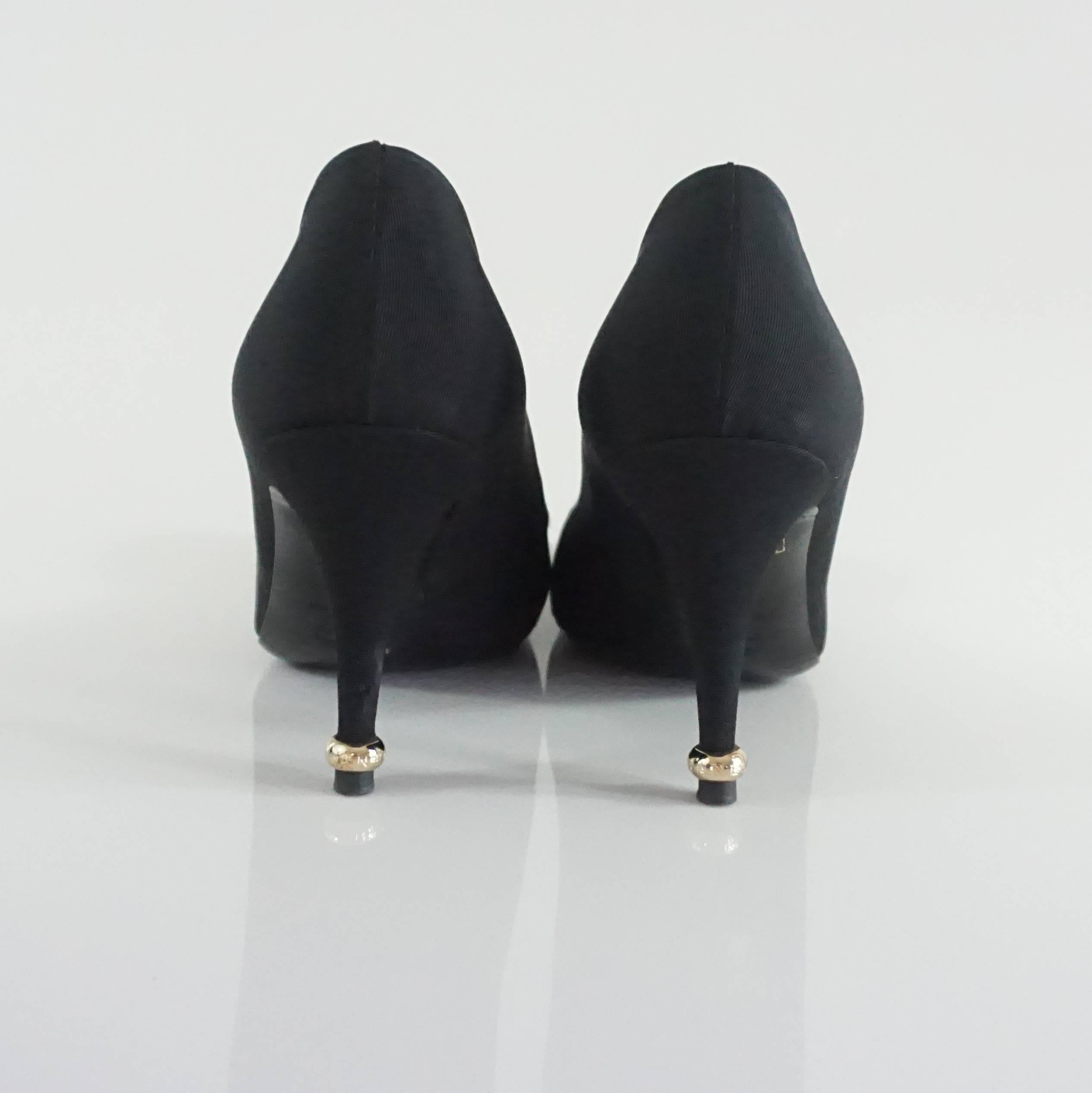 Women's Chanel Black Grosgrain Pumps with Ivory Silk Camellia - 37