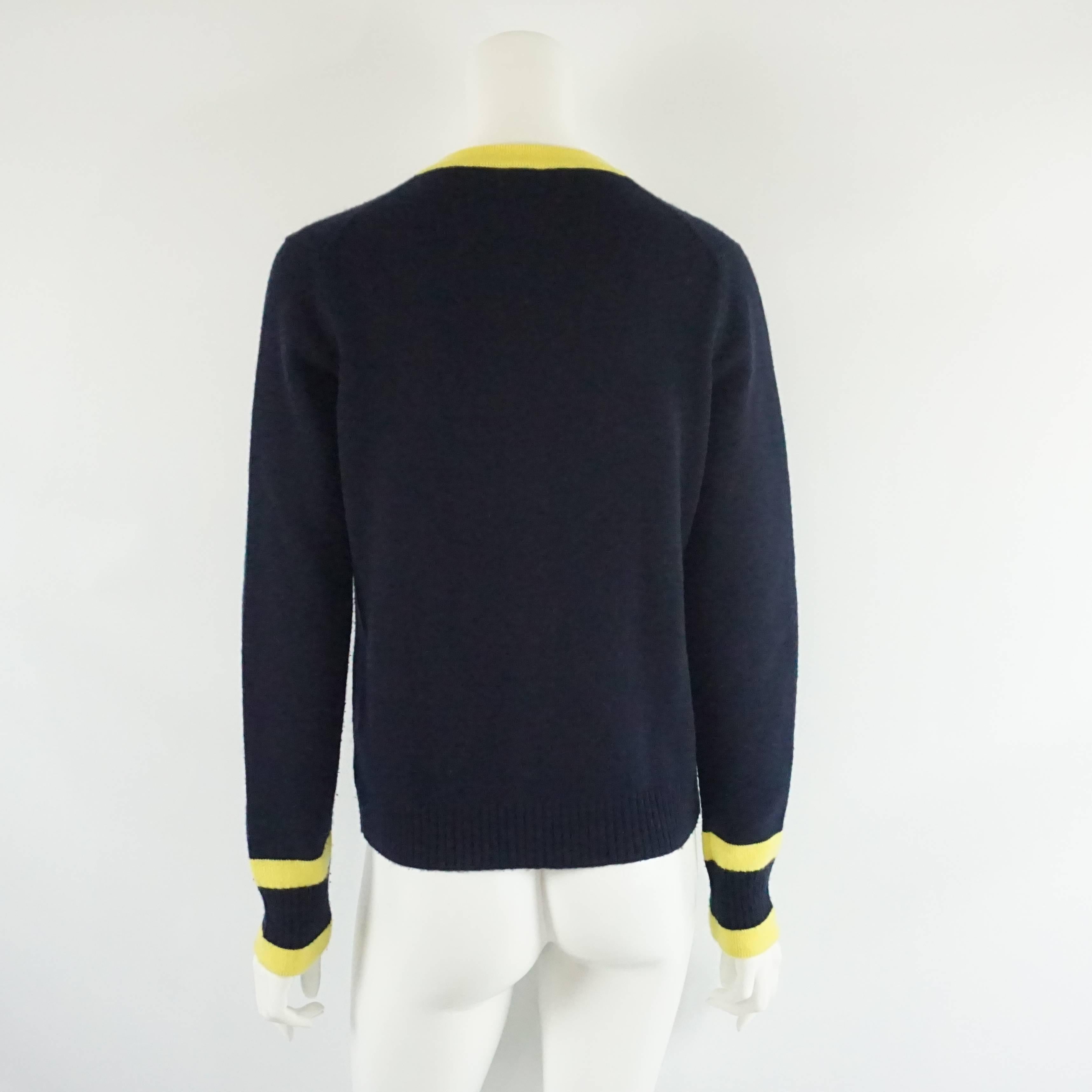 navy and yellow cardigan