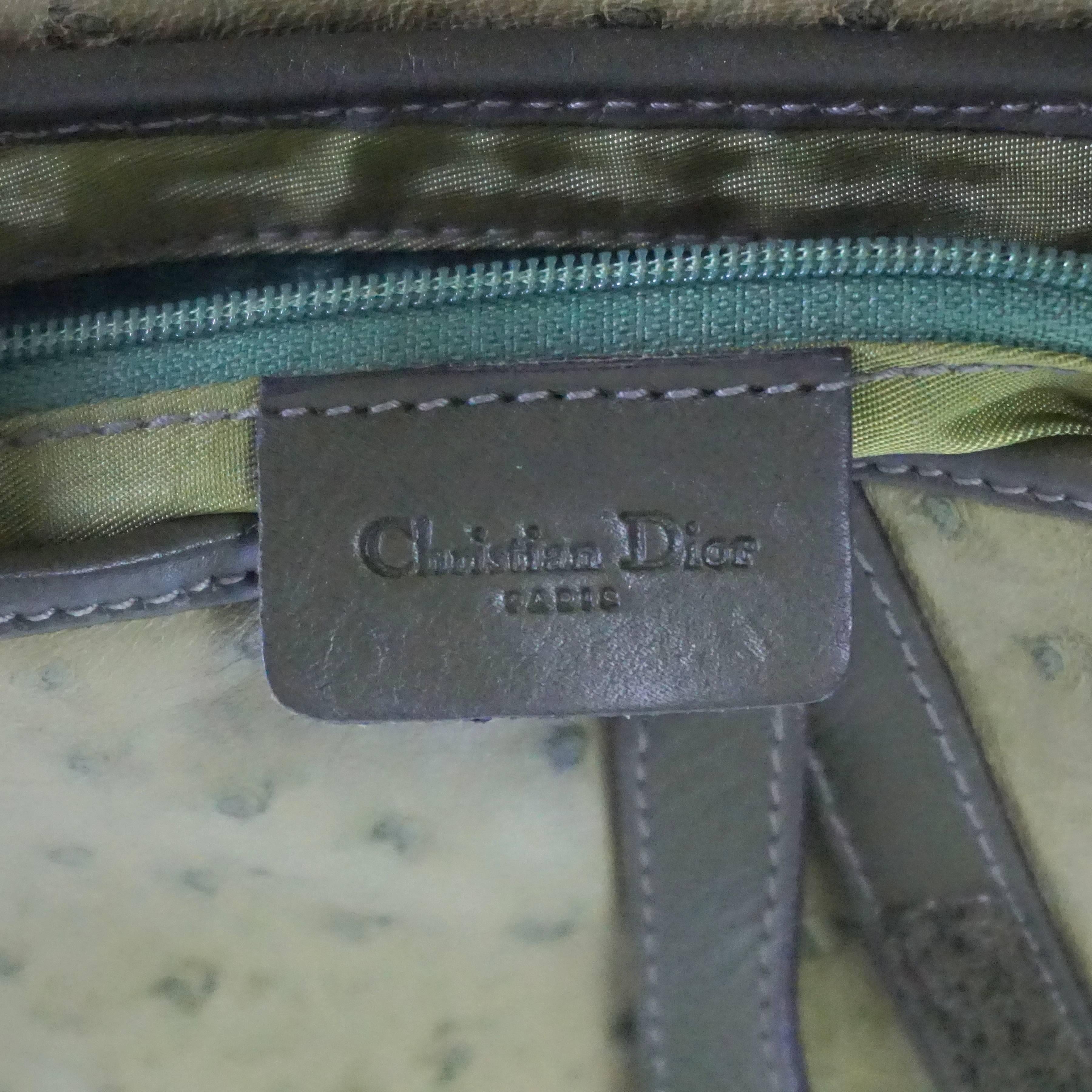 green saddle bag