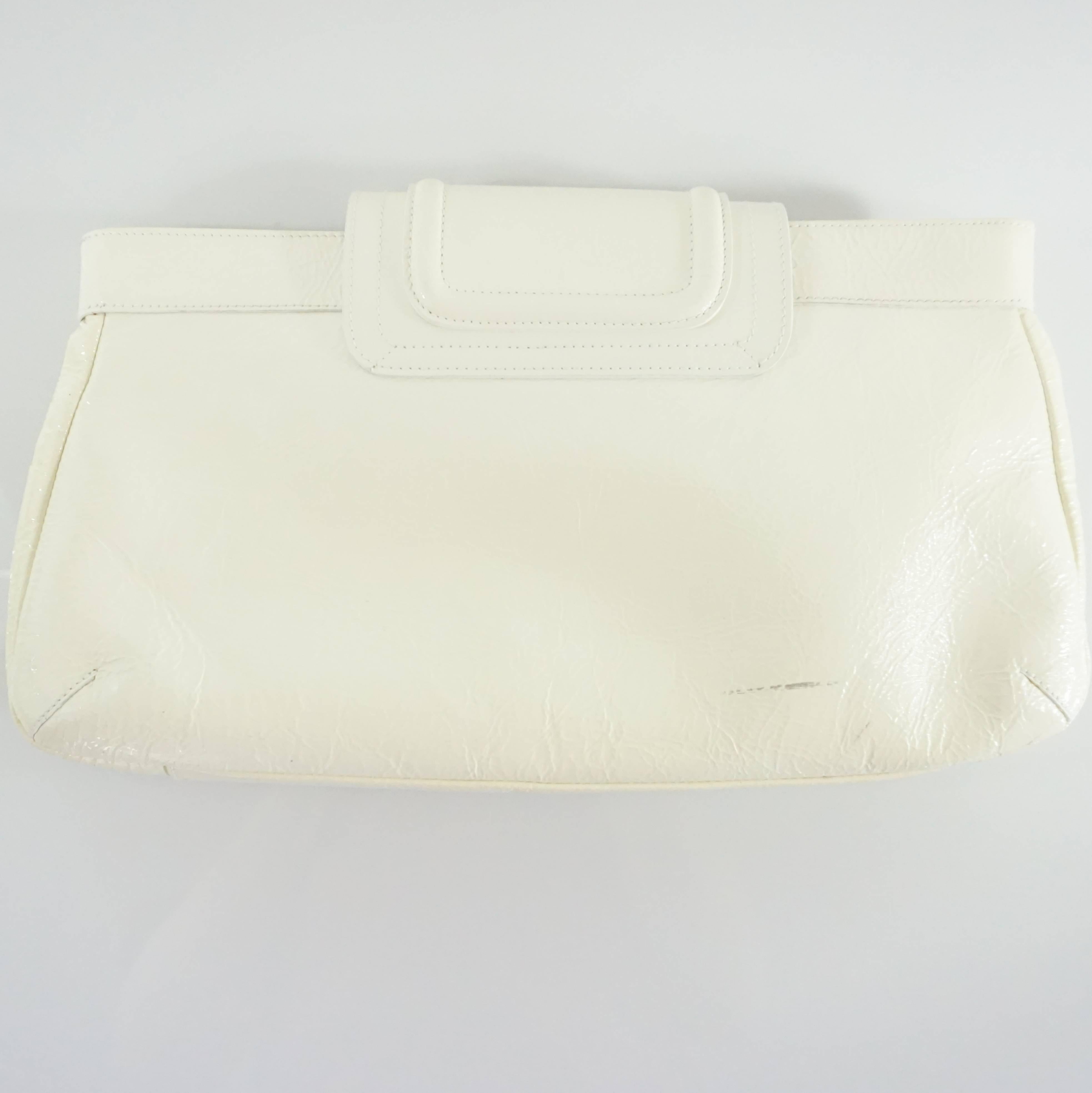 ivory patent clutch bag