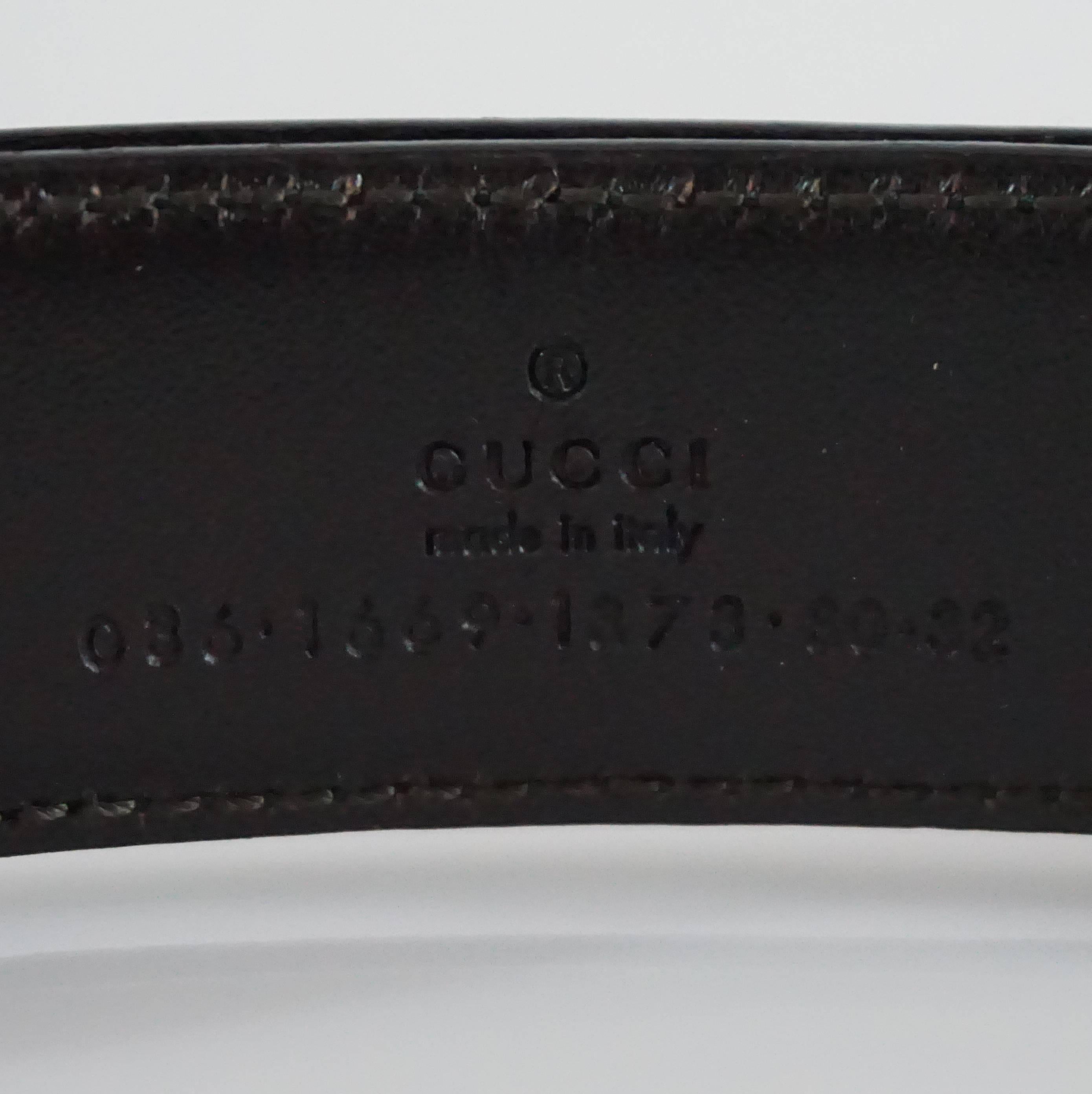 Gucci Black Leather Belt with a Silver Buckle In Fair Condition In West Palm Beach, FL