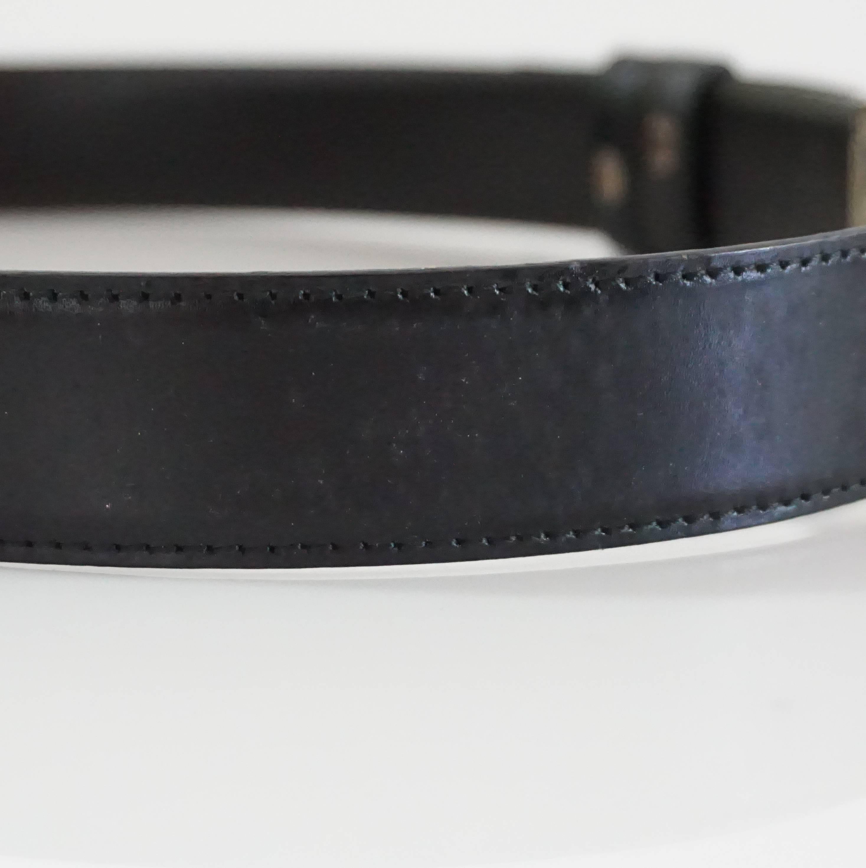 Women's or Men's Gucci Black Leather Belt with a Silver Buckle