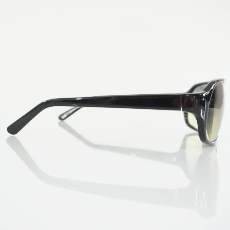 Prada Black Framed Sunglasses with Yellow Tinted Lenses For Sale at