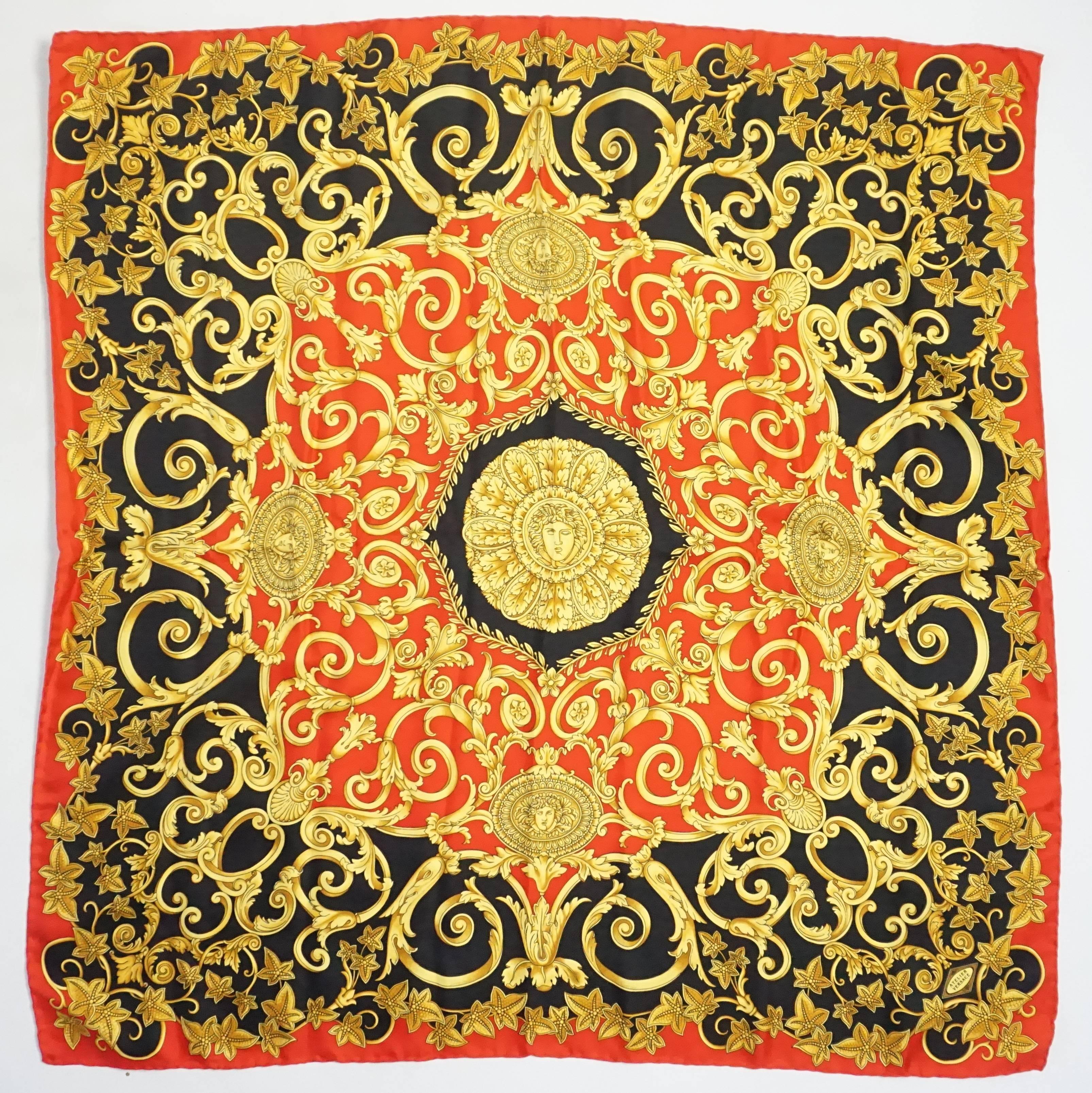 This Versace Atelier scarf is red and black with an intricate gold design and the Medusa head in the middle. It is silk and in excellent condition with a minor stain.

Measurements
Height: 34.75"
Width: 33.75"