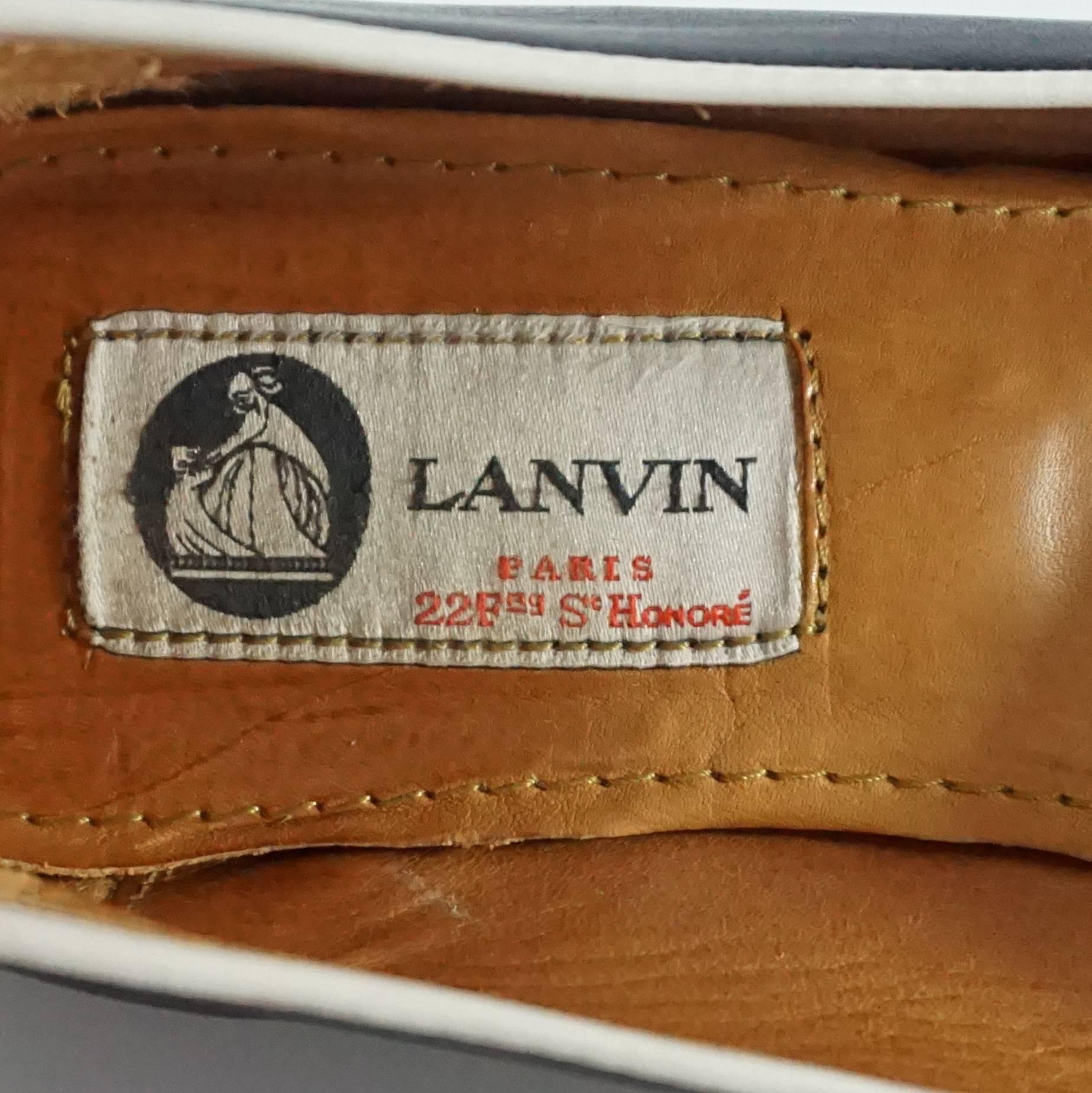 Lanvin Black and Ivory Tassel Loafers - 37.5 In Good Condition In West Palm Beach, FL