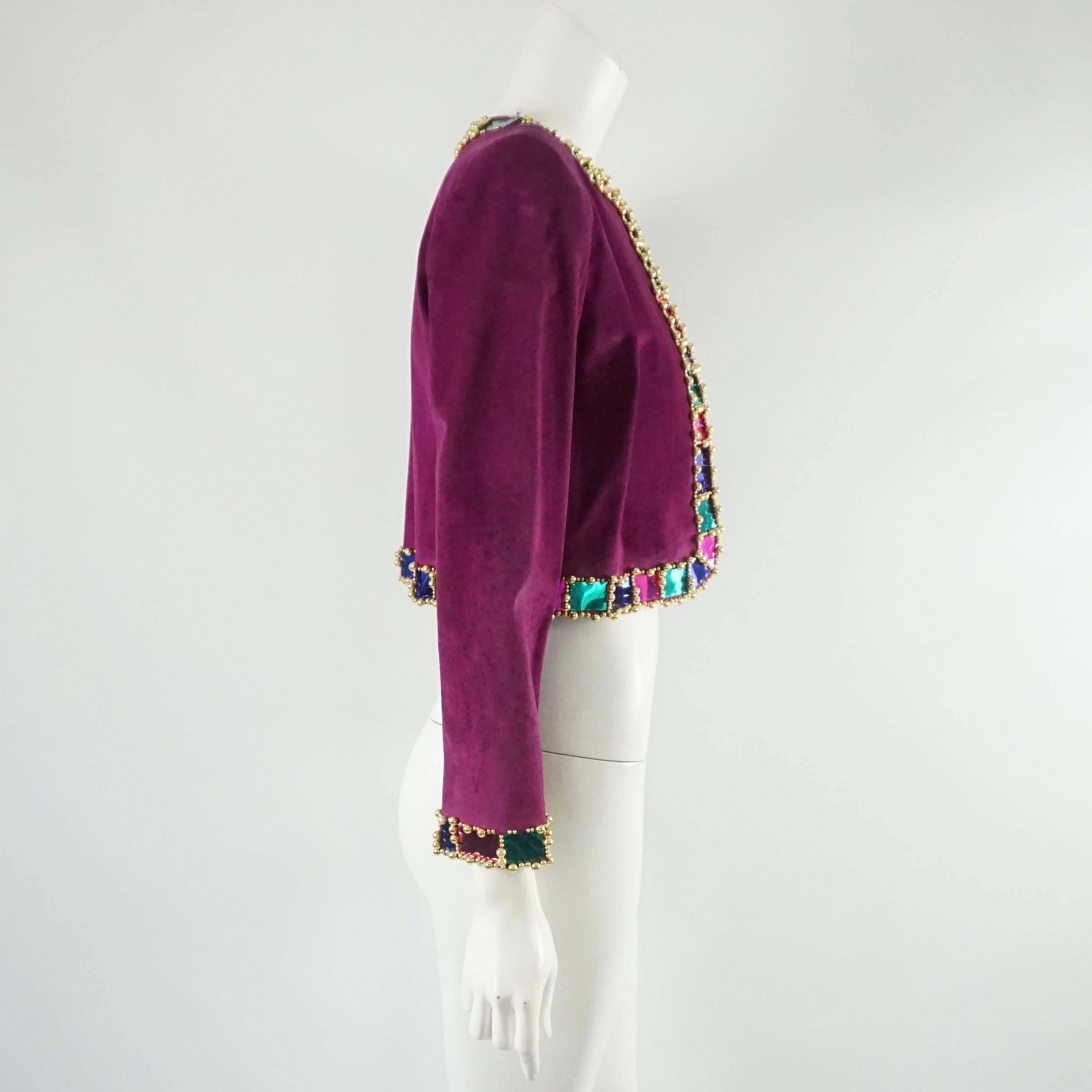Givenchy Vintage Fuchsia Suede Jacket w/ Beading-34. This vintage Givenchy jacket is in good condition with some wear consistent with use. It is fuchsia  and made of suede. The trim of the jacket has beading attached. This jacket is great for a day
