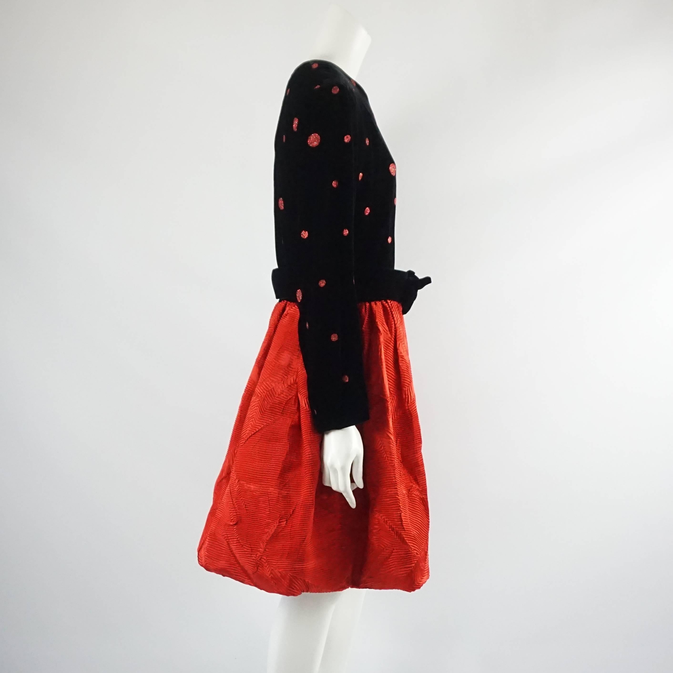 Escada Margaretha Ley Black and Red Velvet Polka Dot Dress-42. This elegant dress by Escada Margaretha Ley is in great condition. It shows barely any sign of use. This dress has a black velvet long sleeve top with red sparkly polka dots and a red
