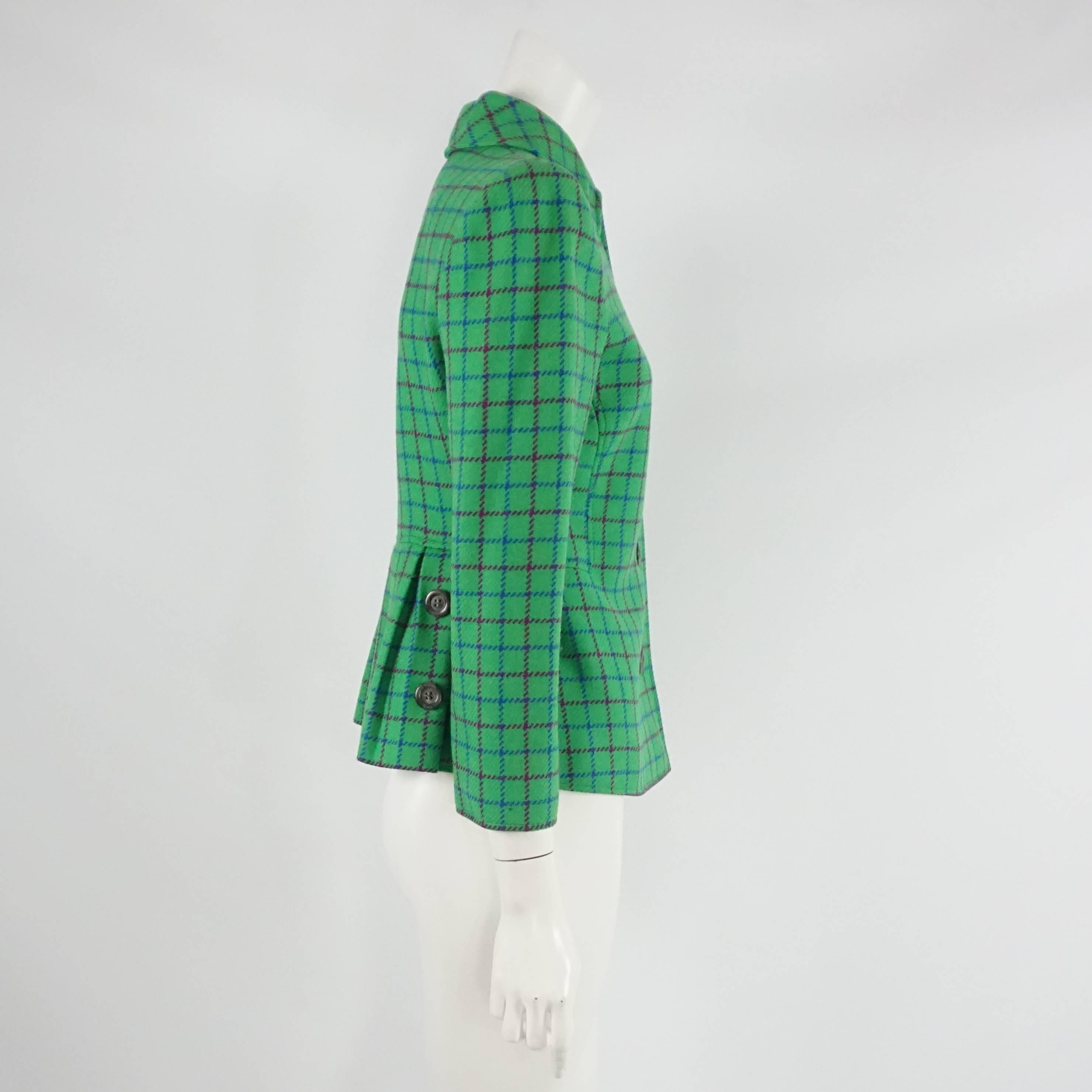 Valentino Green Checkered Wool Jacket - Size 8 - Circa 80's  This spectacular kelly green wool jacket has a blue and wine color chekered detail to the fabric. It is single breasted with 5 buttons down the front of the jacket, the jacket is fitted