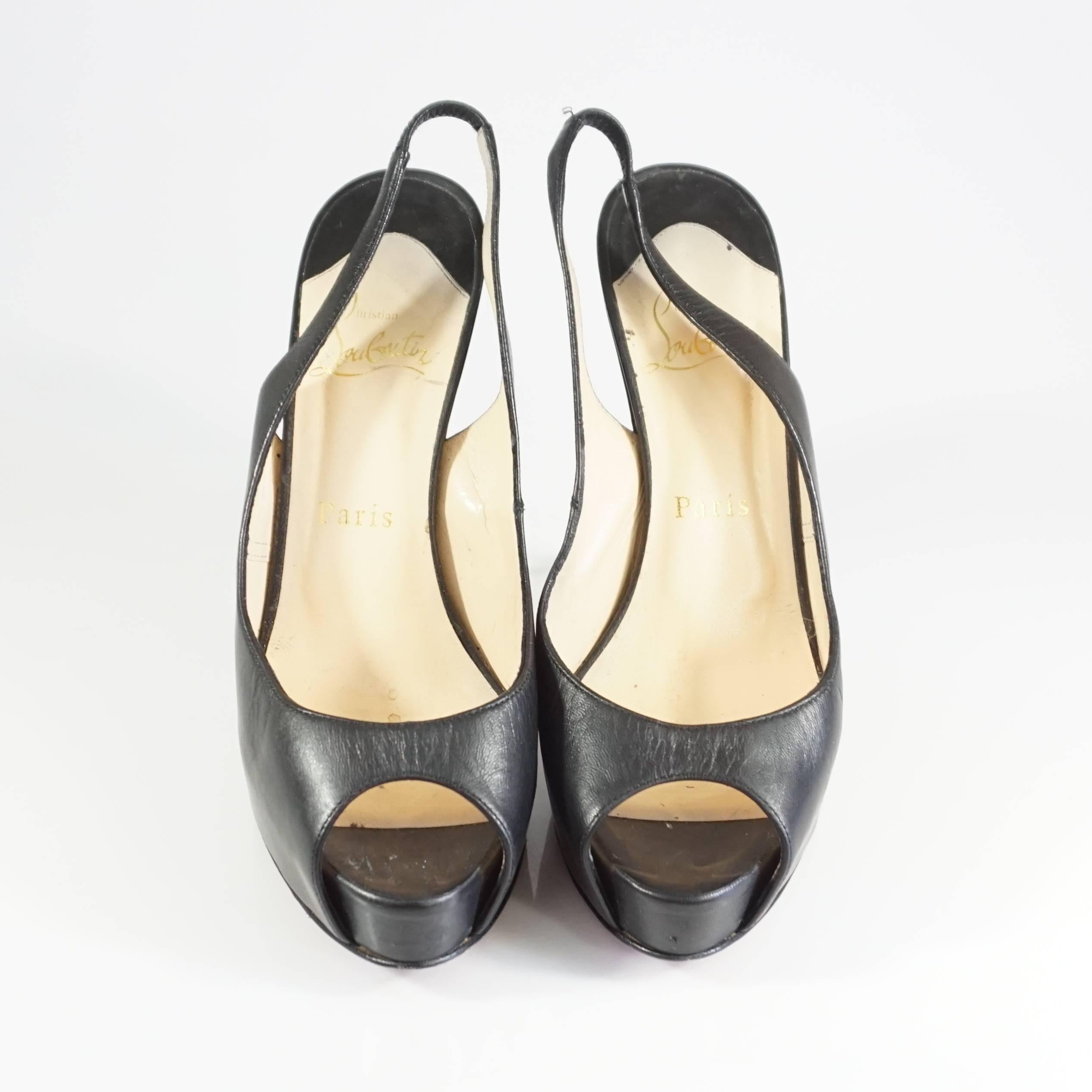 Christian Louboutin Black Leather and Lucite Slingback Peeptoe Platform, 37.5 In Good Condition For Sale In West Palm Beach, FL