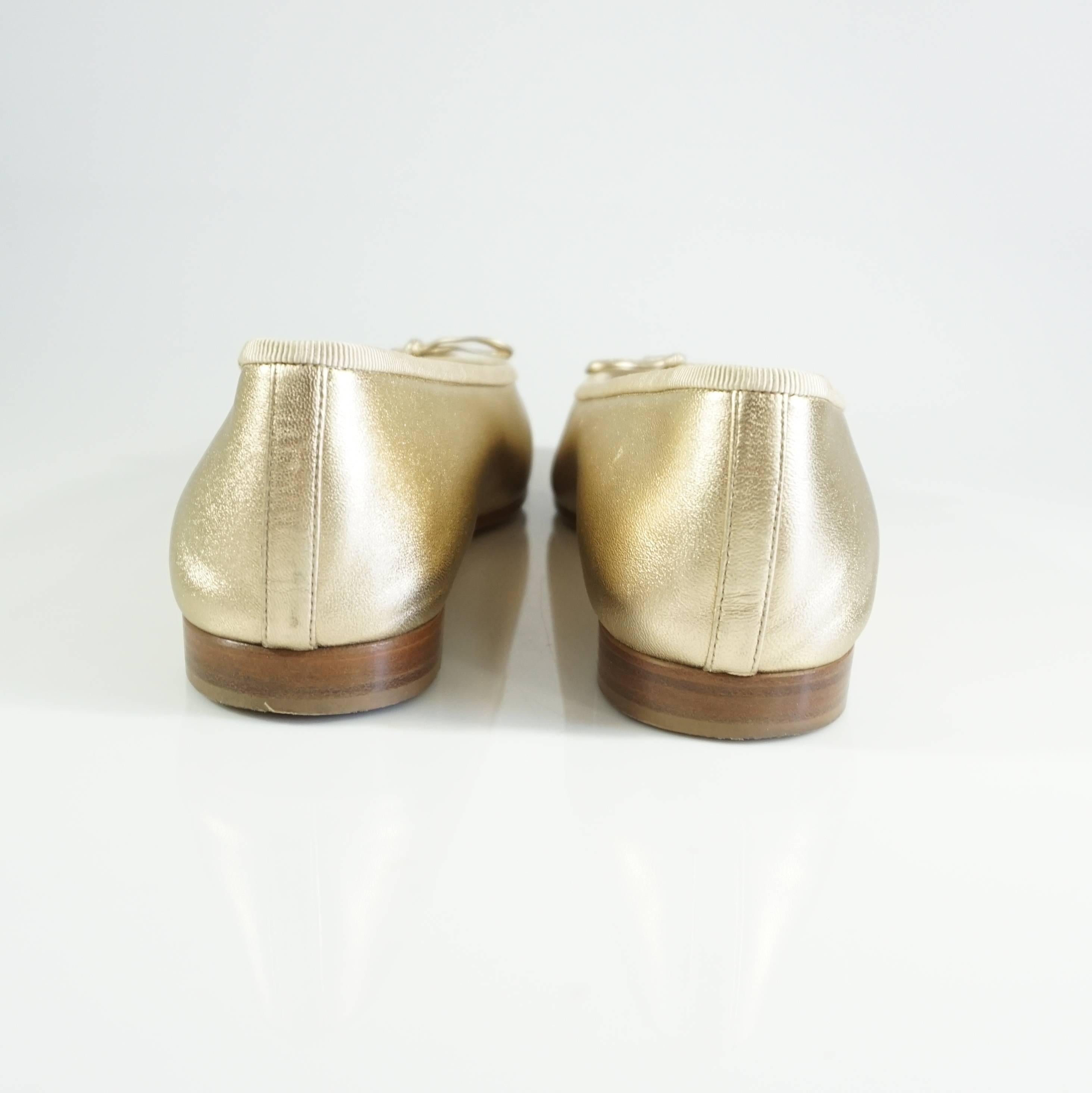 chanel gold ballet flats