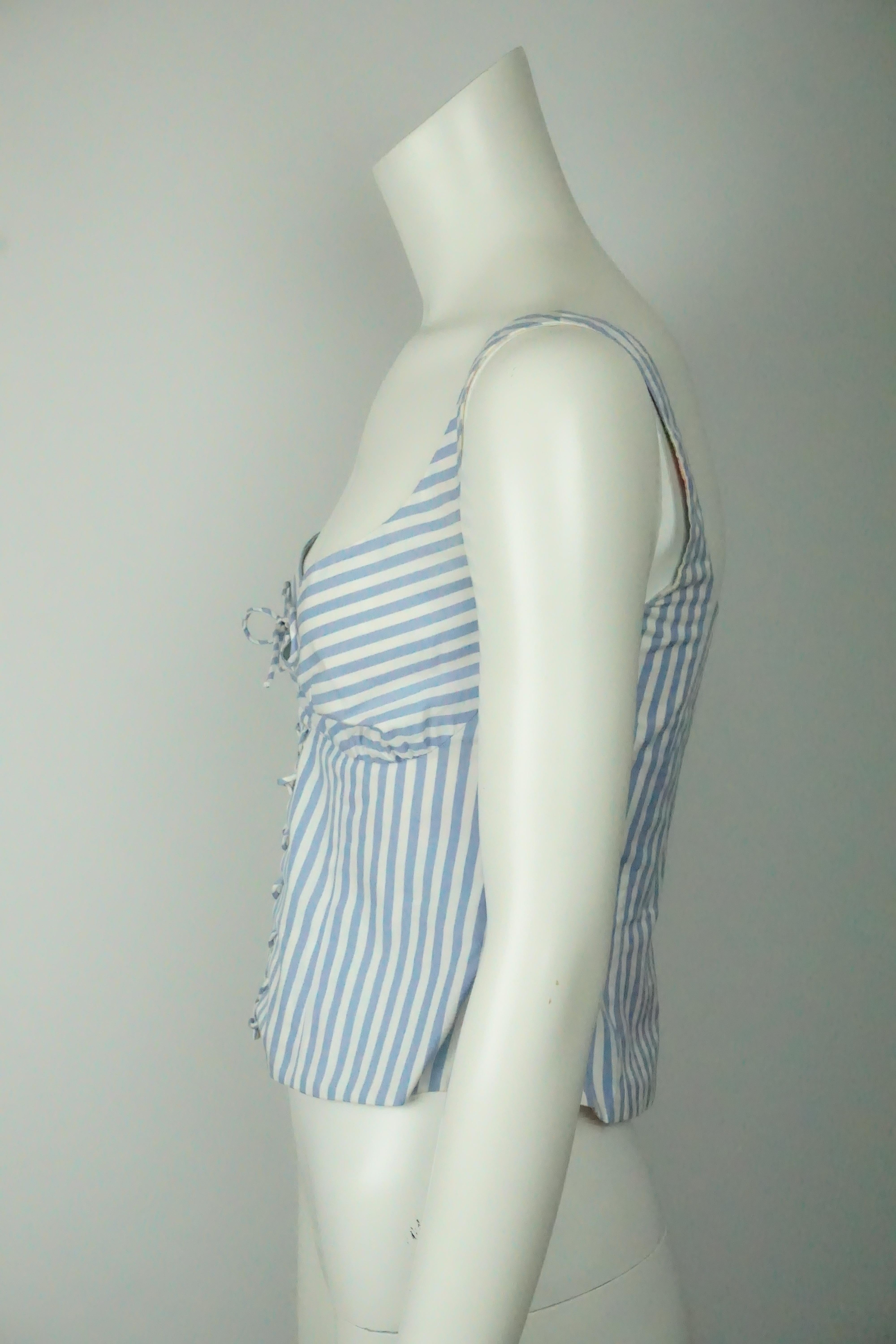 Ralph Lauren BL Blue and White Striped Bustier Crop Top - 2    This adorable top is in excellent condition. There is a small stain on the back of the top that is hardly recognizable. The top is a bustier style top that has front lacing and ties on