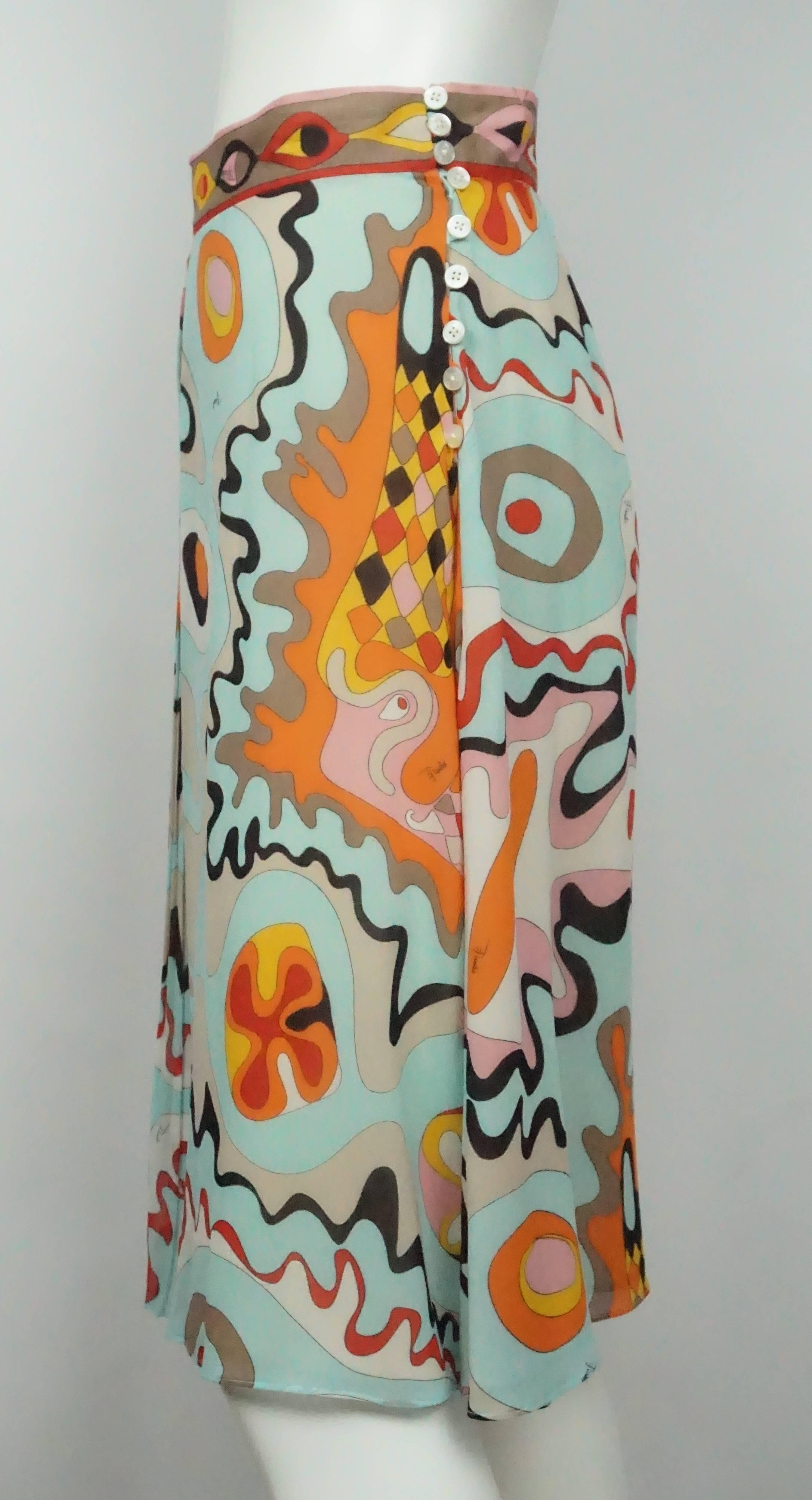 Emilio Pucci Multi Color Silk Chiffon Skirt - 12  This beautiful Silk Chiffon Print A Line Skirt is very colorful and feminine. It has a 1.75